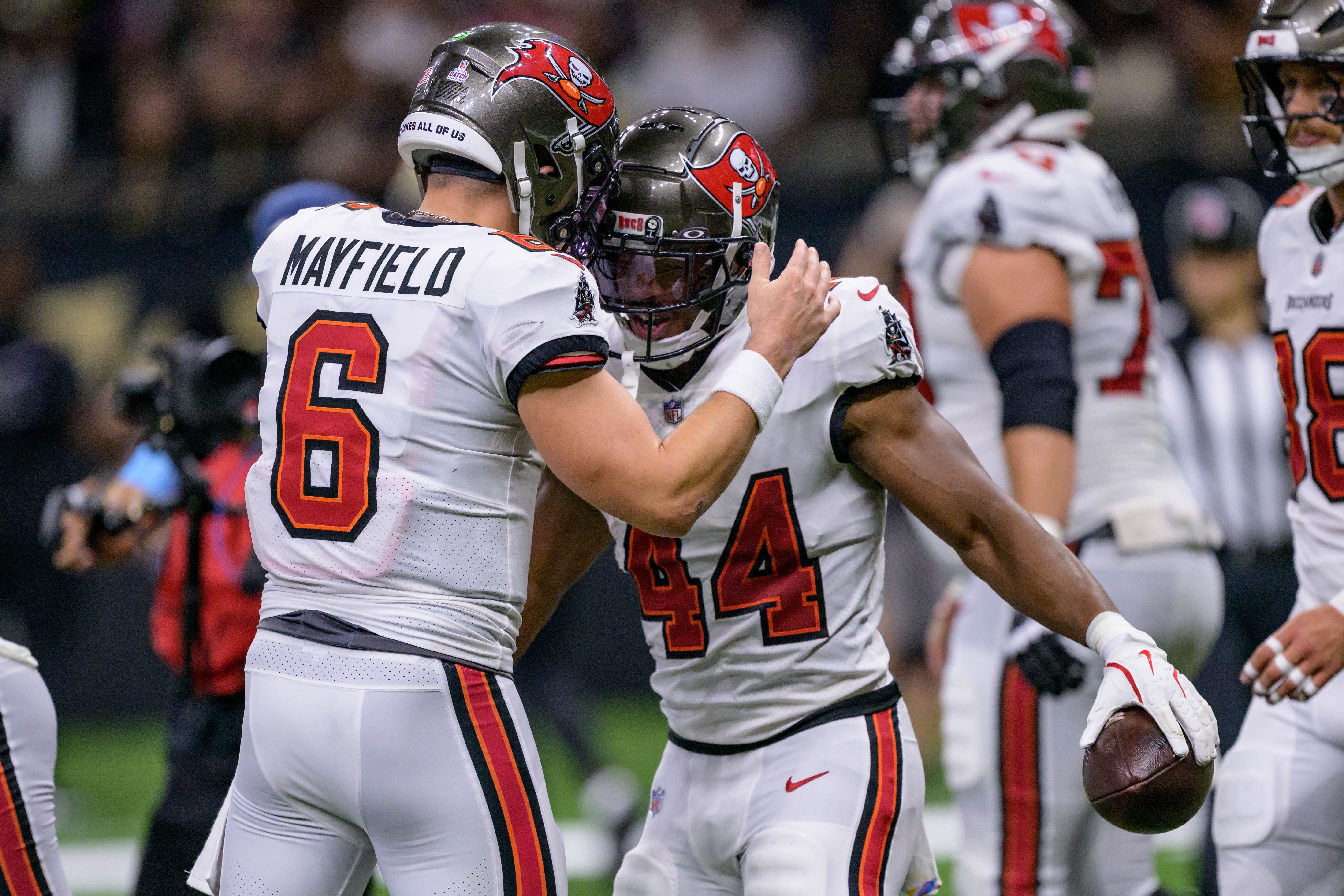 Oct 13, 2024; New Orleans, Louisiana, USA; Tampa Bay Buccaneers quarterback Baker Mayfield (6) celebrates a touchdown by Tampa Bay Buccaneers running back Sean Tucker (44) against the New Orleans Saints during the second quarter at Caesars Superdome.
