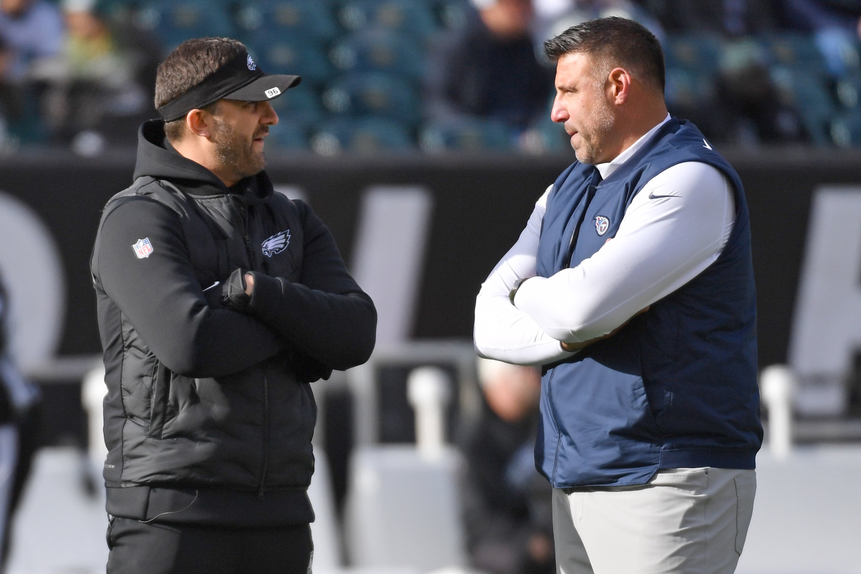 Dec 4, 2022; Philadelphia, Pennsylvania, USA; Philadelphia Eagles head coach Nick Sirianni and Tennessee Titans head coach Mike Vrabel on the field before game at Lincoln Financial Field.