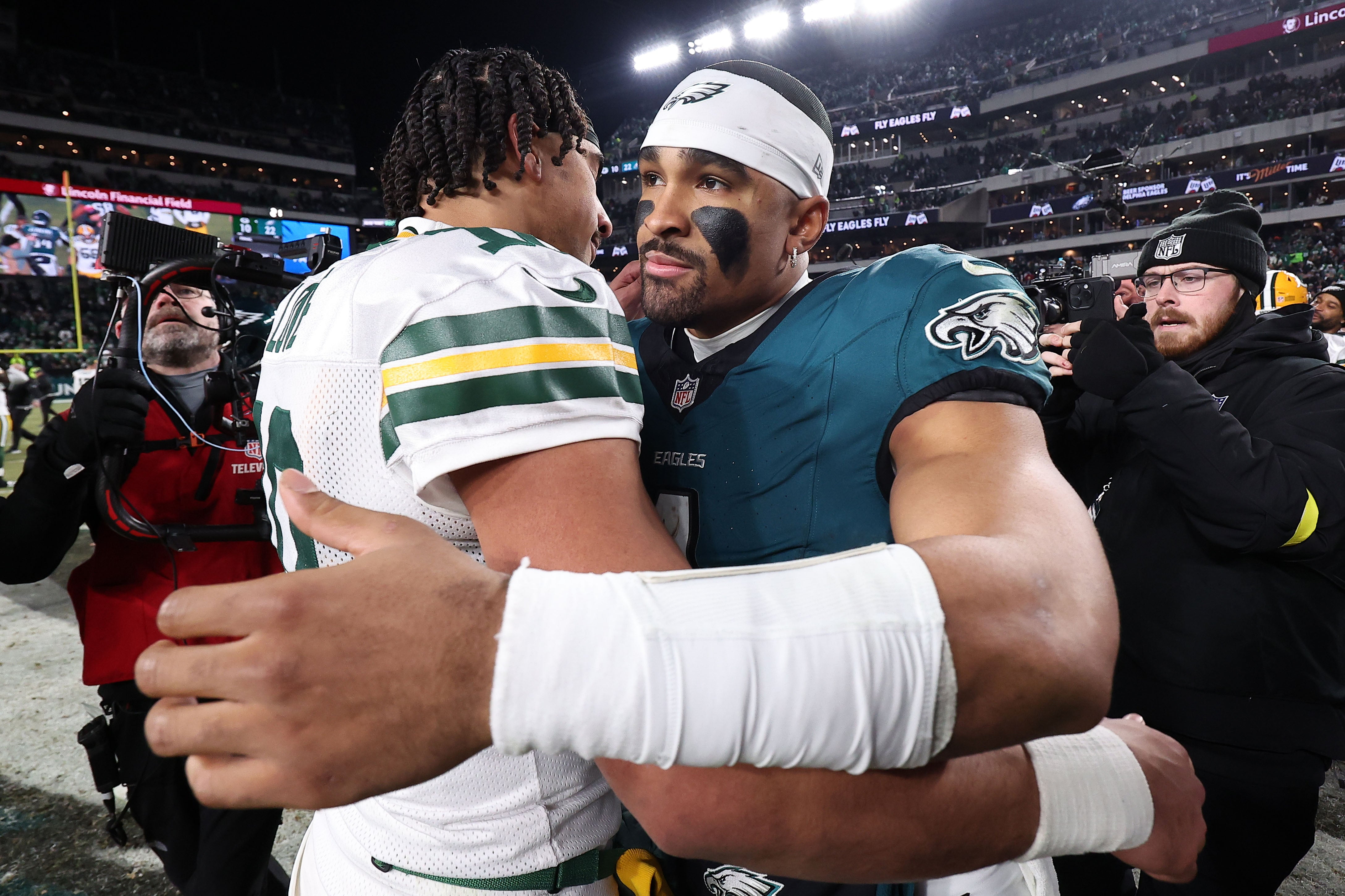 Green Bay Packers quarterback Jordan Love (10) and Philadelphia Eagles quarterback Jalen Hurts (1) shake hands after the game in an NFC wild card game at Lincoln Financial Field.