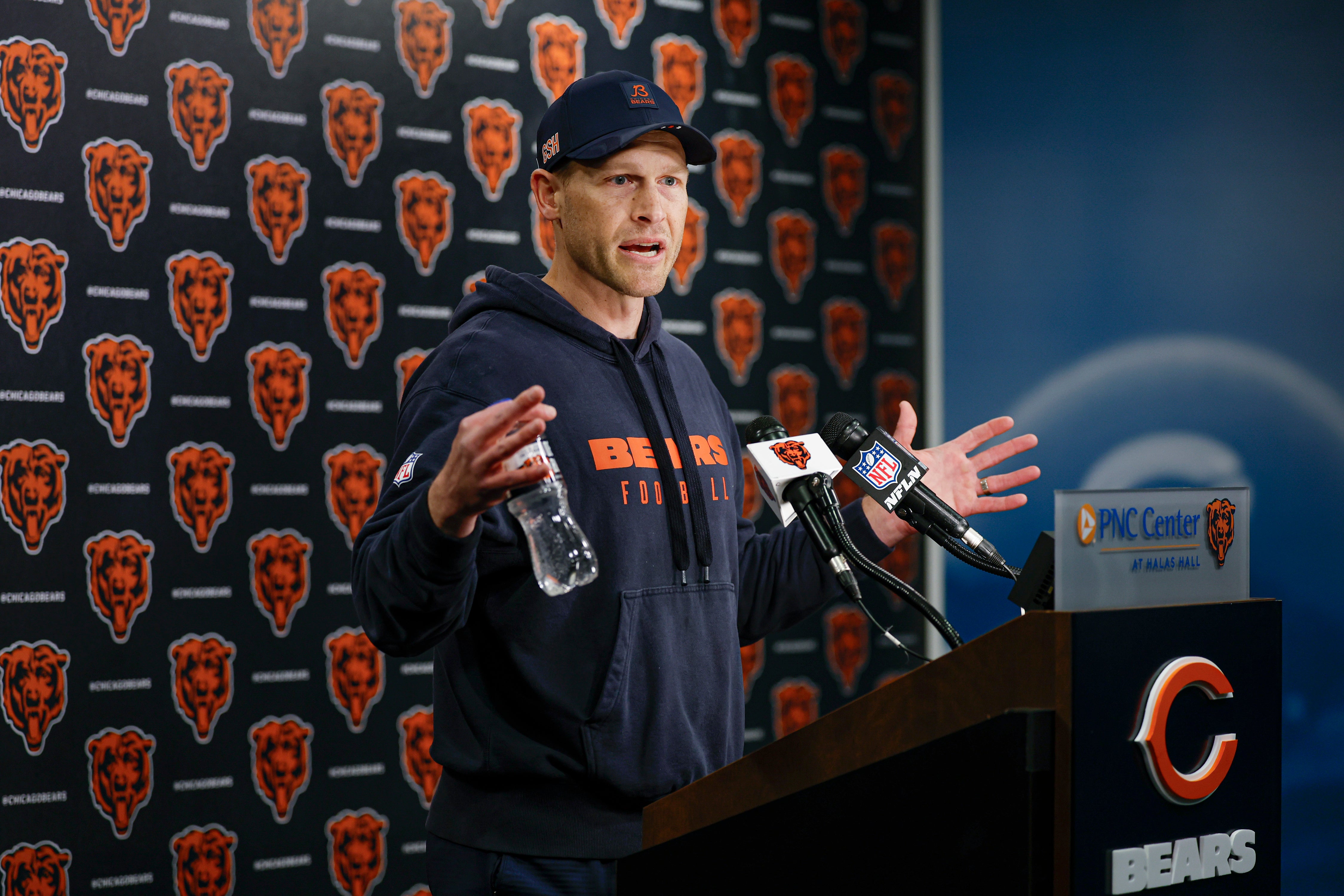 May 9, 2025; Lake Forest, IL, USA; Chicago Bears head coach Ben Johnson (R) speaks during the Rookie Minicamp at Halas Hall.
