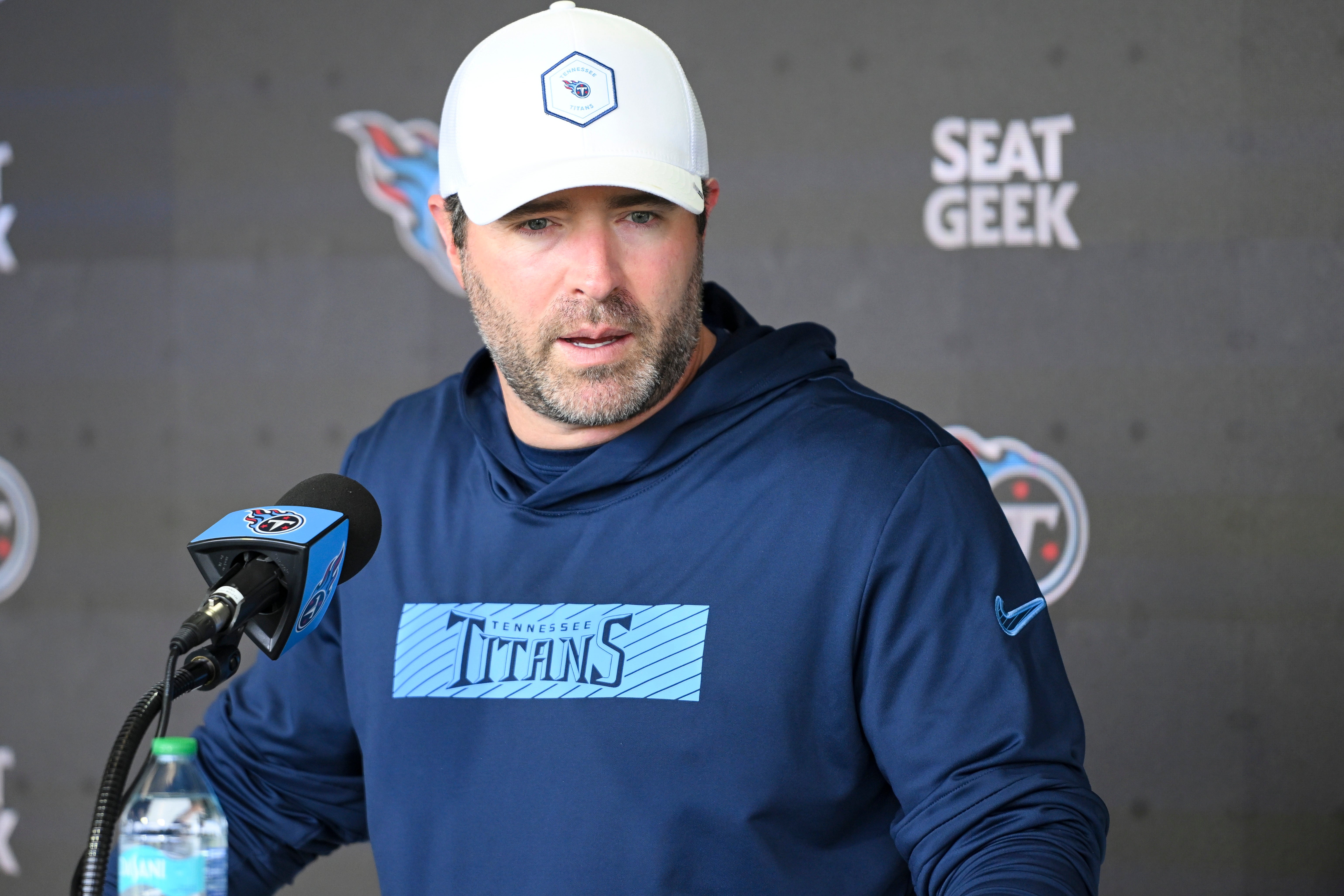May 10, 2025; Nashville, TN, USA; Tennessee Titans head coach Brian Callahan talks with reporters just prior to the start of rookie training camp at Saint Thomas Sports ParkTennessee. Mandatory Credit: Steve Roberts-Imagn Images
