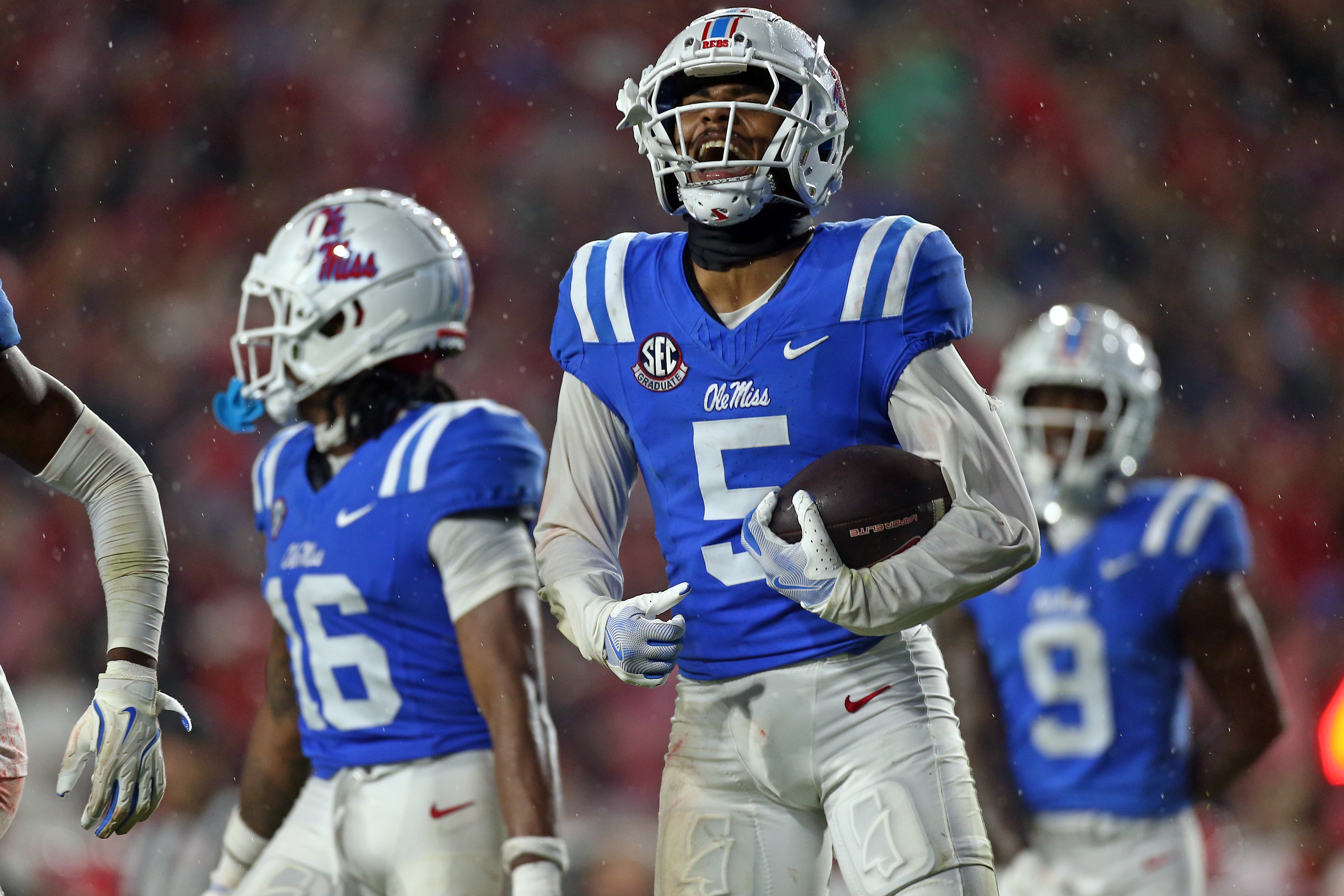 Nov 9, 2024; Oxford, Mississippi, USA; Mississippi Rebels defensive back John Saunders Jr. (5) reacts after an interception during the second half against the Georgia Bulldogs at Vaught-Hemingway Stadium.