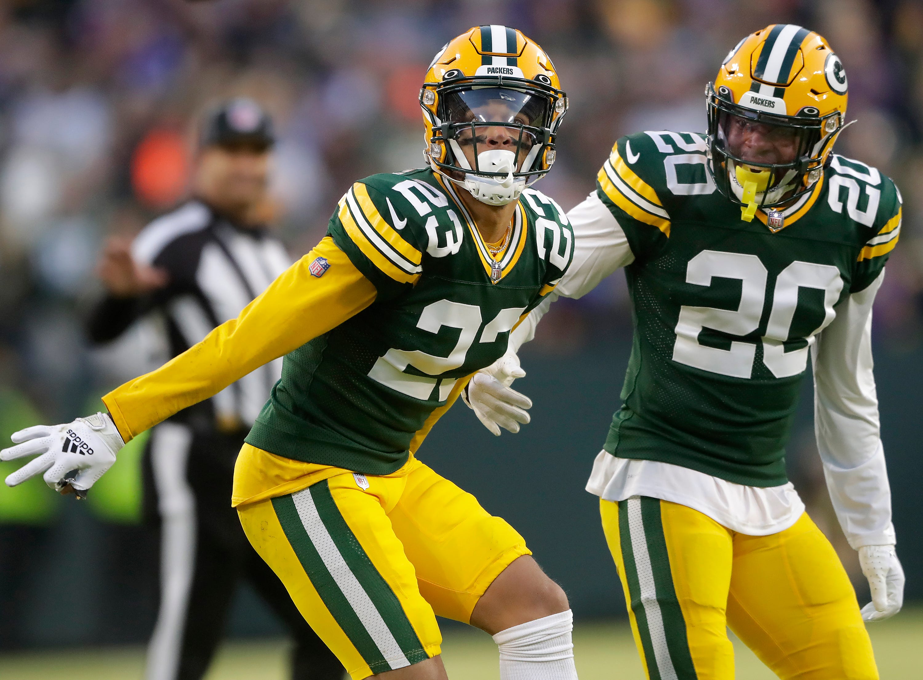 Green Bay Packers cornerback Jaire Alexander (23) and safety Rudy Ford (20) celebrate after breaking up a pass play against the Minnesota Vikings during their football game on Sunday, January, 1, 2023 at Lambeau Field in Green Bay, Wis. 
