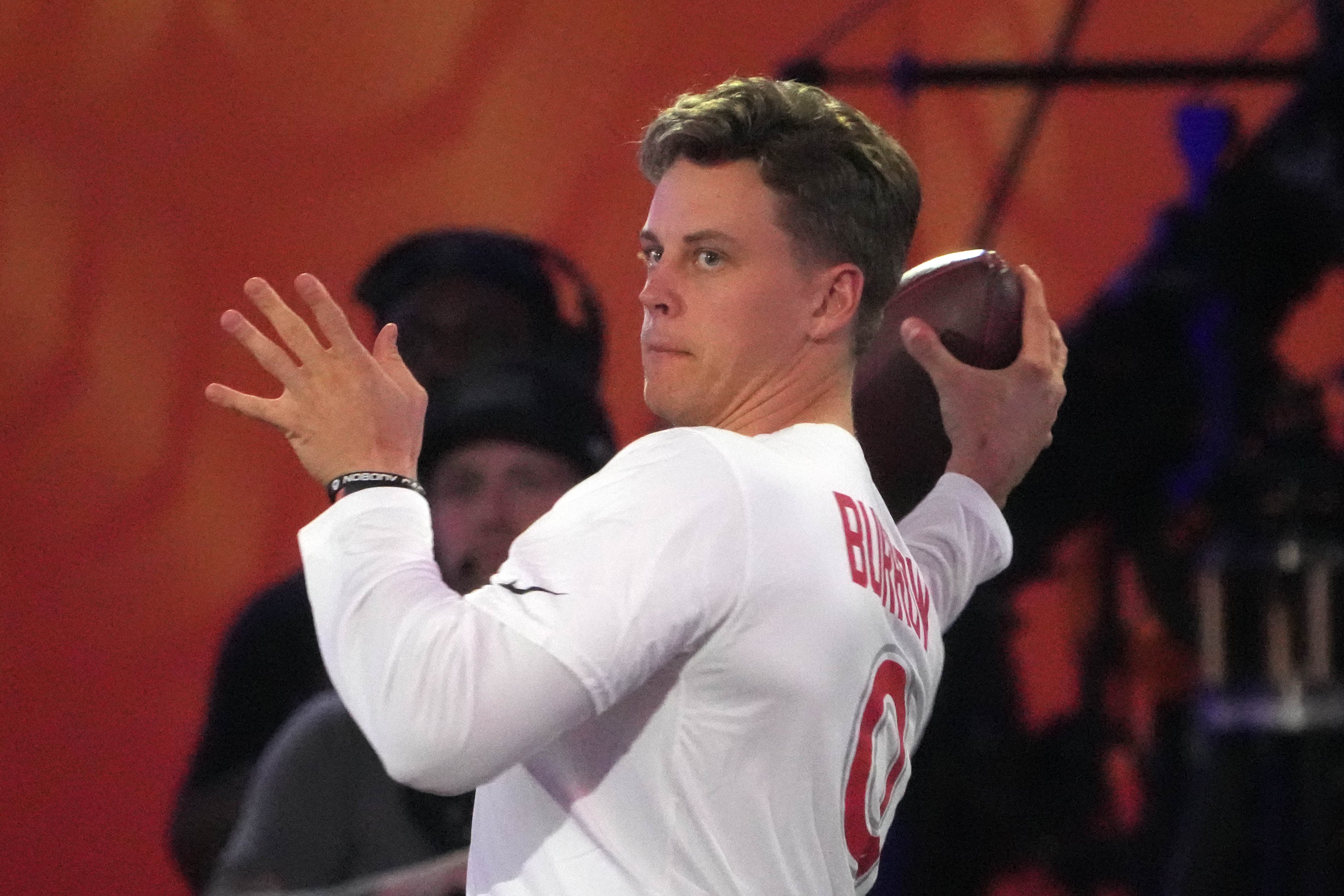 Jan 30, 2025; Orlando, FL, USA; AFC quarterback Joe Burrow of the Cincinnati Bengals throws the ball during the Passing the Test event at the Pro Bowl Skills Challenge at Nicholson Fieldhouse.