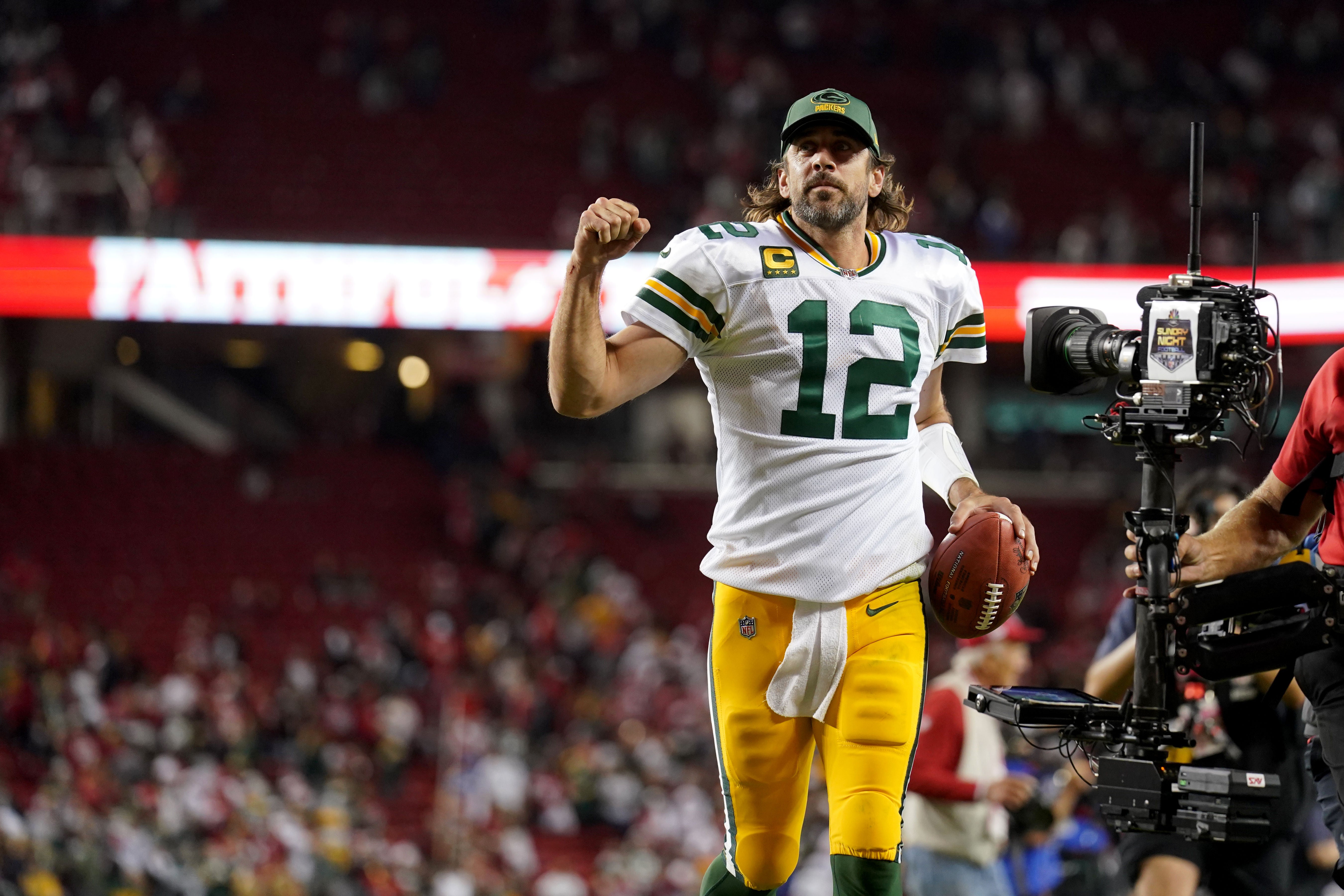 Green Bay Packers quarterback Aaron Rodgers (12) jogs towards the locker room after the Packers defeated the San Francisco 49ers 30-28 at Levi's Stadium.
