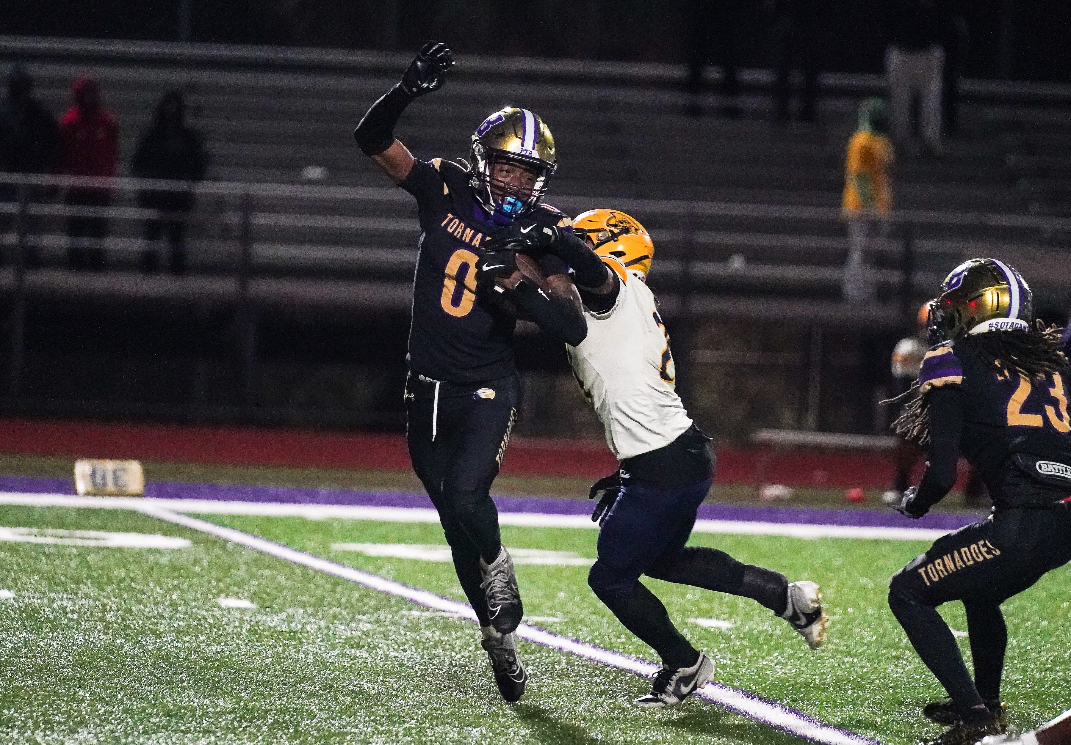 Booker's Chauncey Kennon runs upfield during the Class 3A-Region 3 Final against Boca Ciega in Sarasota on Friday, Nov. 29, 2024. Booker won 41-6.