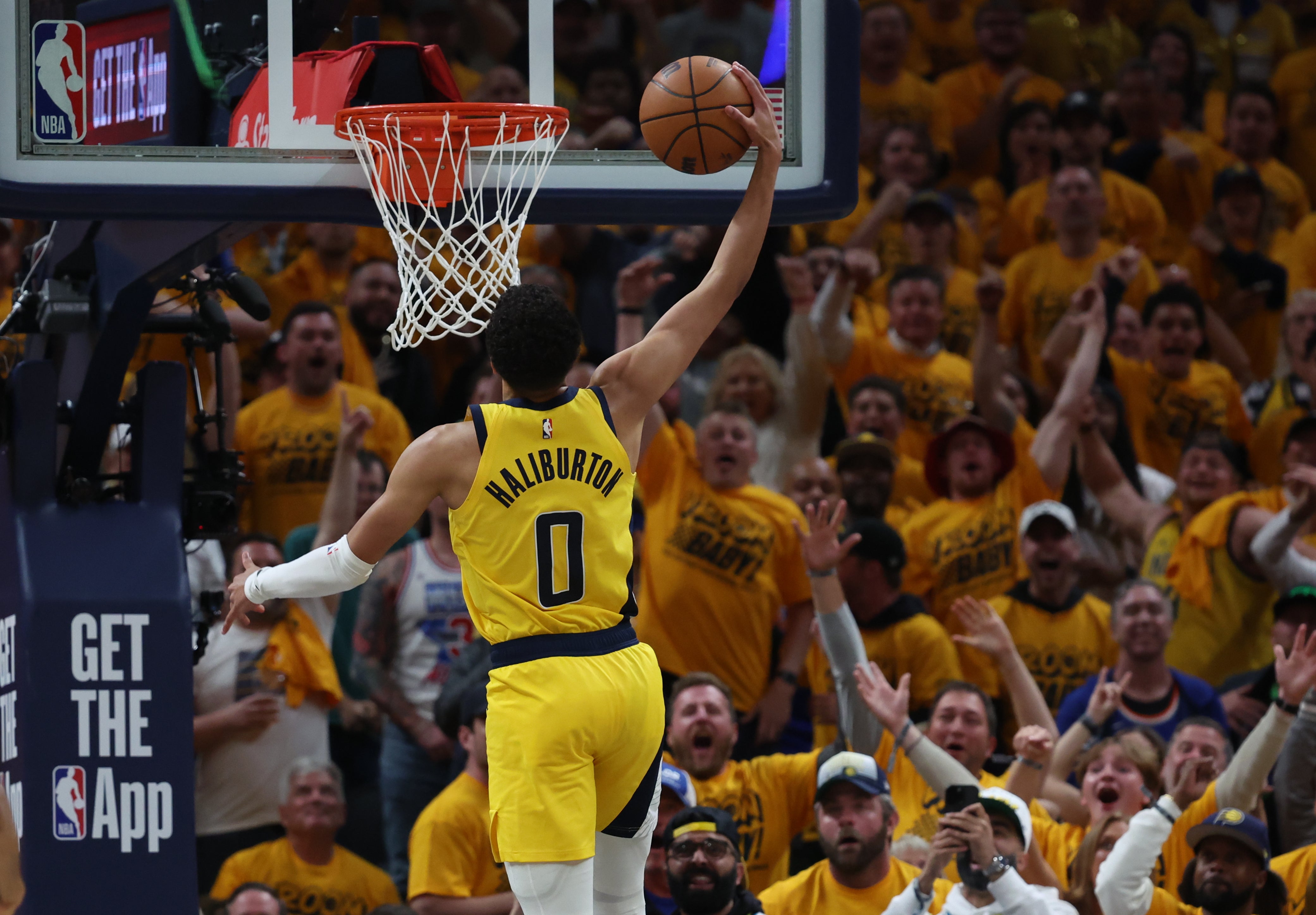 May 25, 2025; Indianapolis, Indiana, USA; Indiana Pacers guard Tyrese Haliburton (0) dunks during the second quarter against the New York Knicks during game three of the eastern conference finals for the 2025 NBA Playoffs at Gainbridge Fieldhouse.