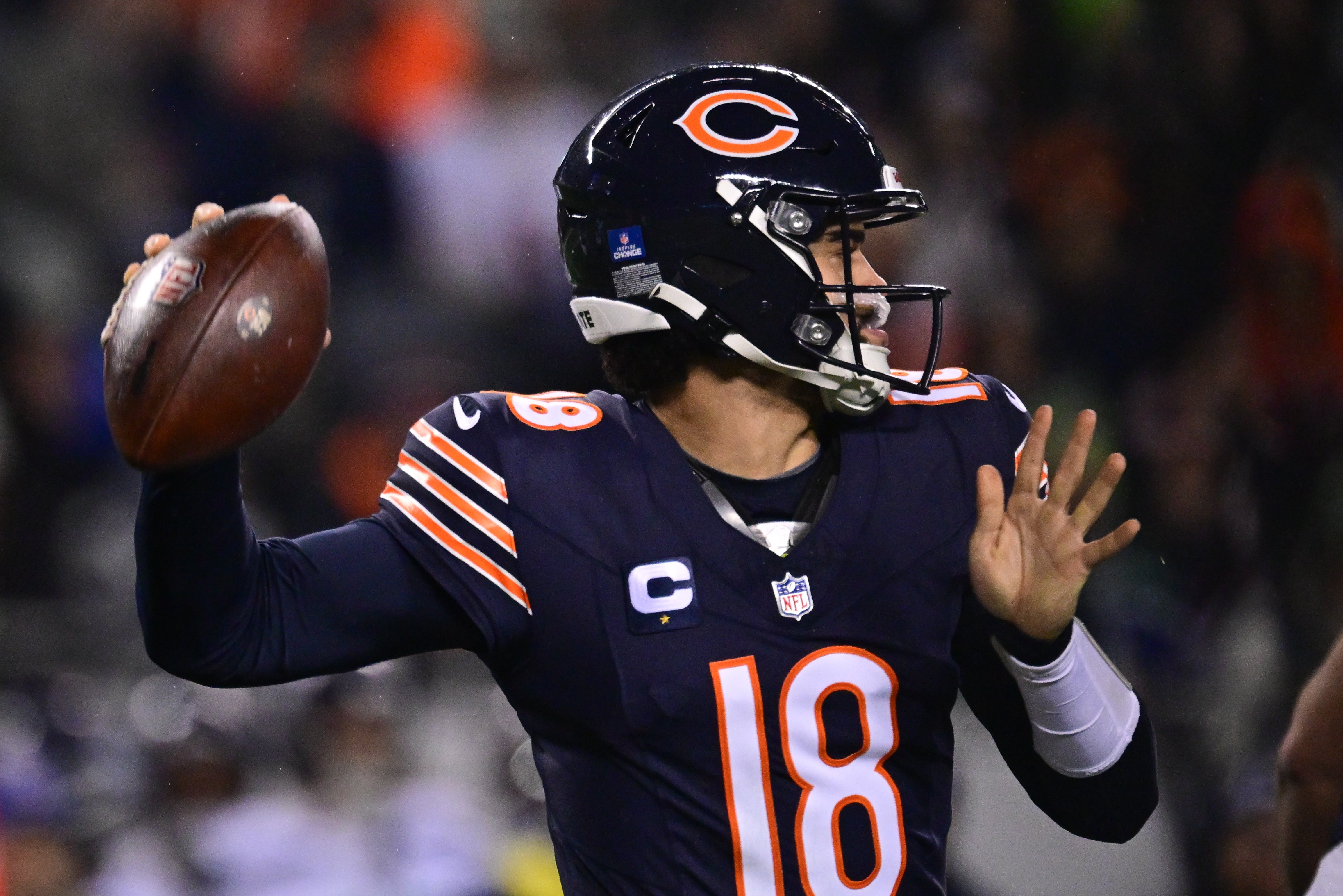 Dec 26, 2024; Chicago, Illinois, USA; Chicago Bears quarterback Caleb Williams (18) passes the ball against the Seattle Seahawks during the first quarter at Soldier Field.