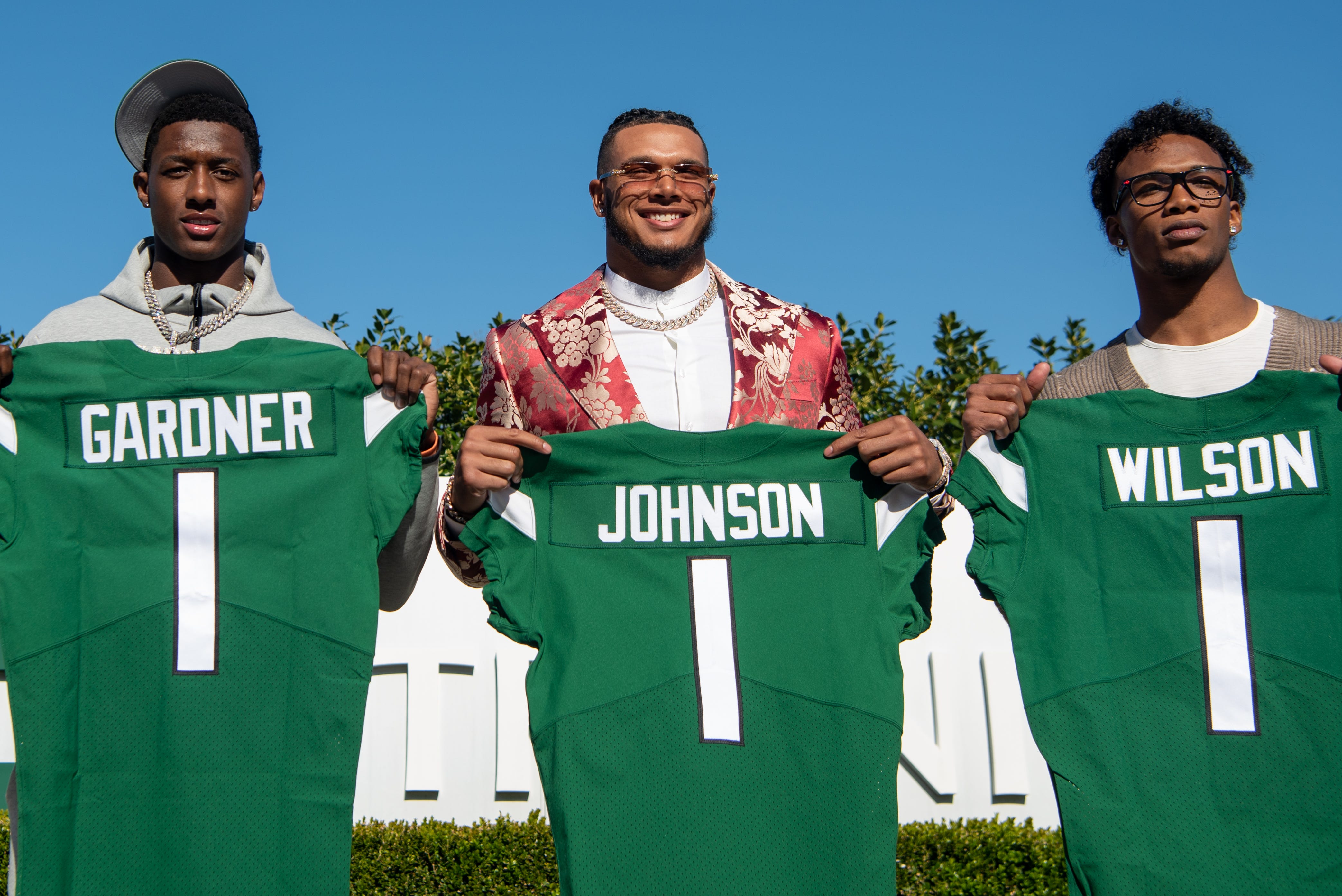 New York Jets introduce all three of their 2022 first-round NFL Draft picks. (From left) Ahmad \"Sauce\" Gardner, Jermaine Johnson and Garrett Wilson pose for a photo holding their jerseys during a press conference at Atlantic Health Jets Training Center in Florham Park, NJ on Friday April 29, 2022. Jets 1st Round Draft Picks 2022