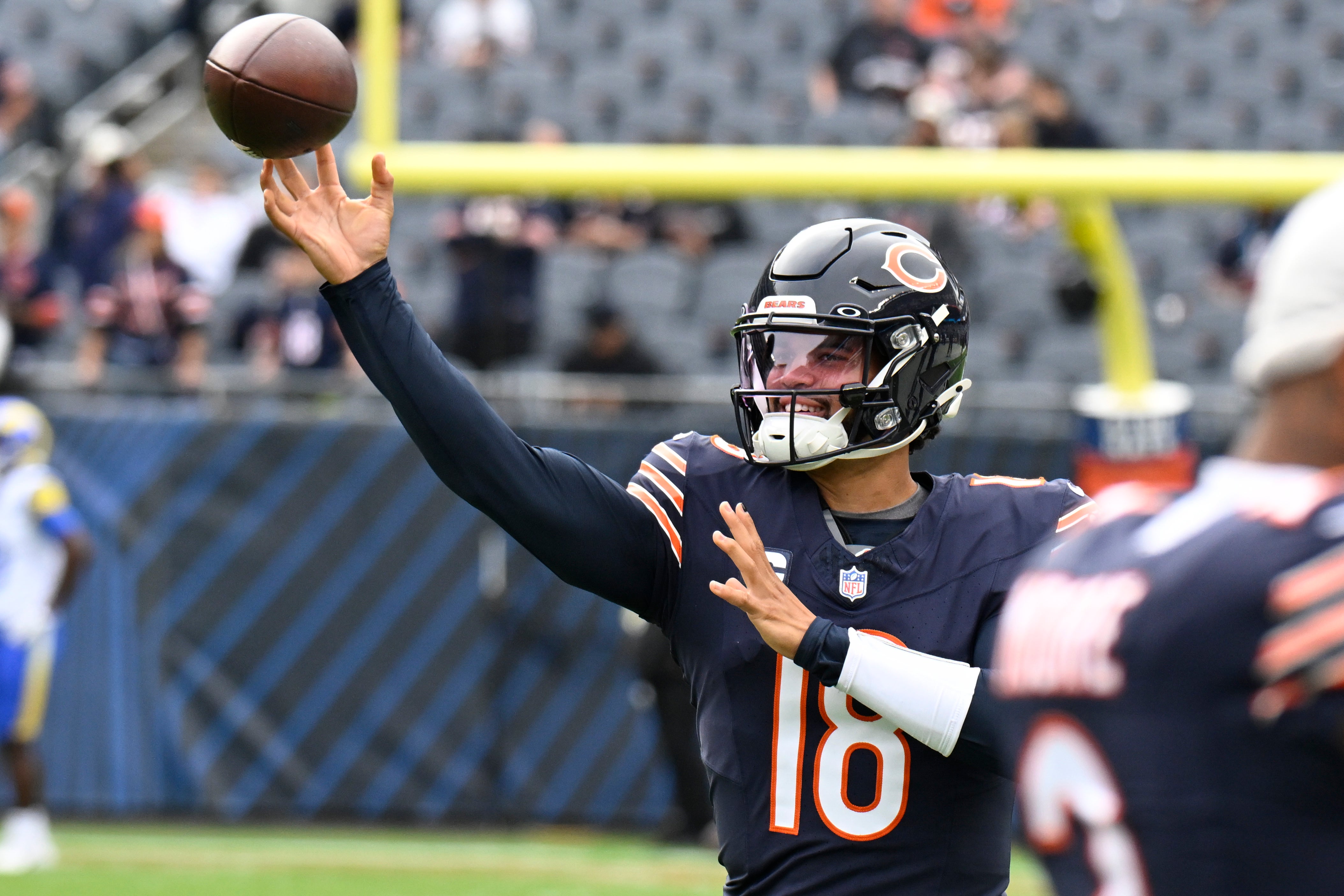 Sep 29, 2024; Chicago, Illinois, USA; Chicago Bears quarterback Caleb Williams (18) warms up before the game against the Los Angeles Rams at Soldier Field.