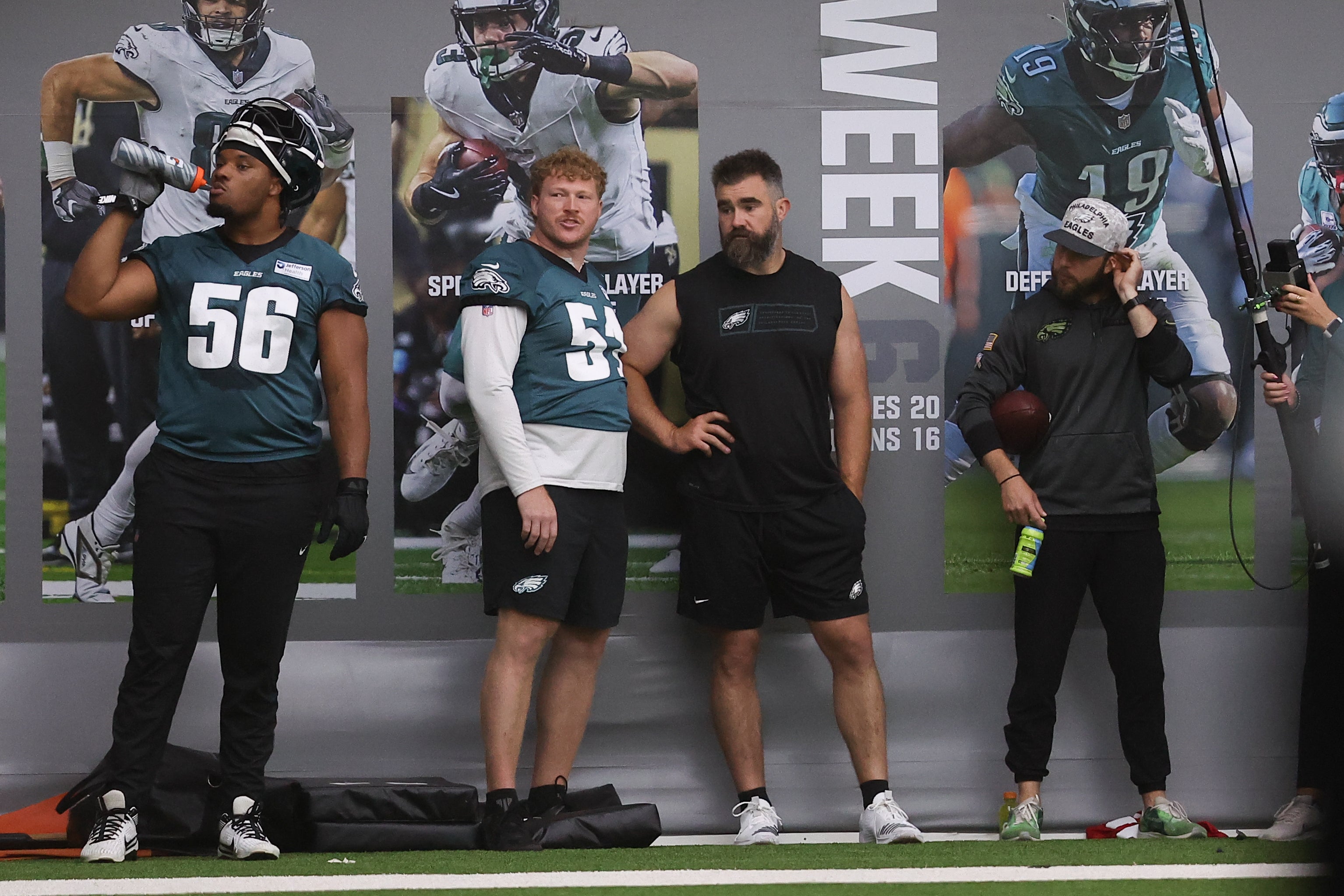 Philadelphia Eagles center Cam Jurgens (51) talks with former Eagles Jason Kelce during OTAs at NovaCare Complex.