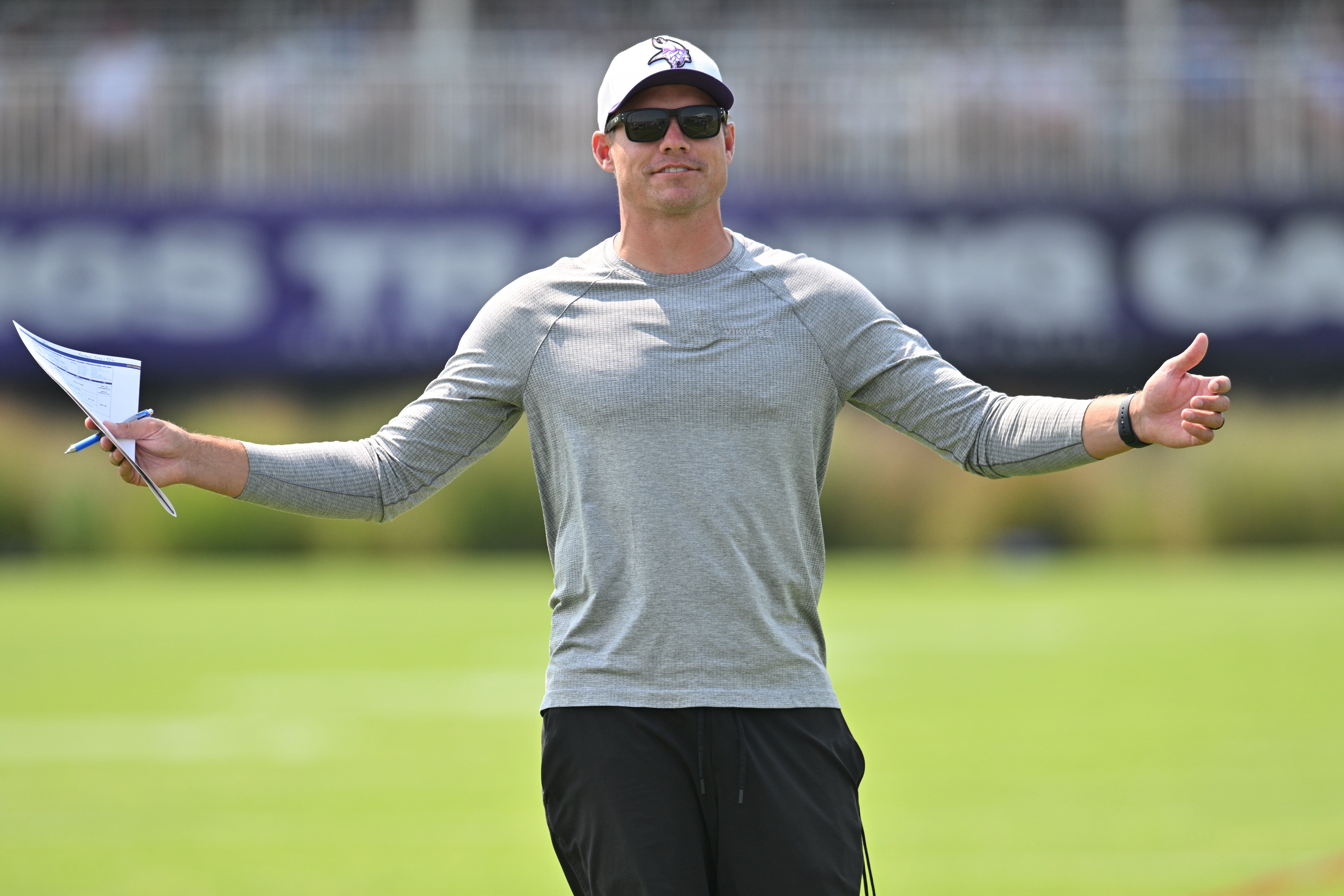 Aug 3, 2024; Eagan, MN, USA; Minnesota Vikings head coach Kevin O'Connell reacts during practice at Vikings training camp in Eagan, MN.