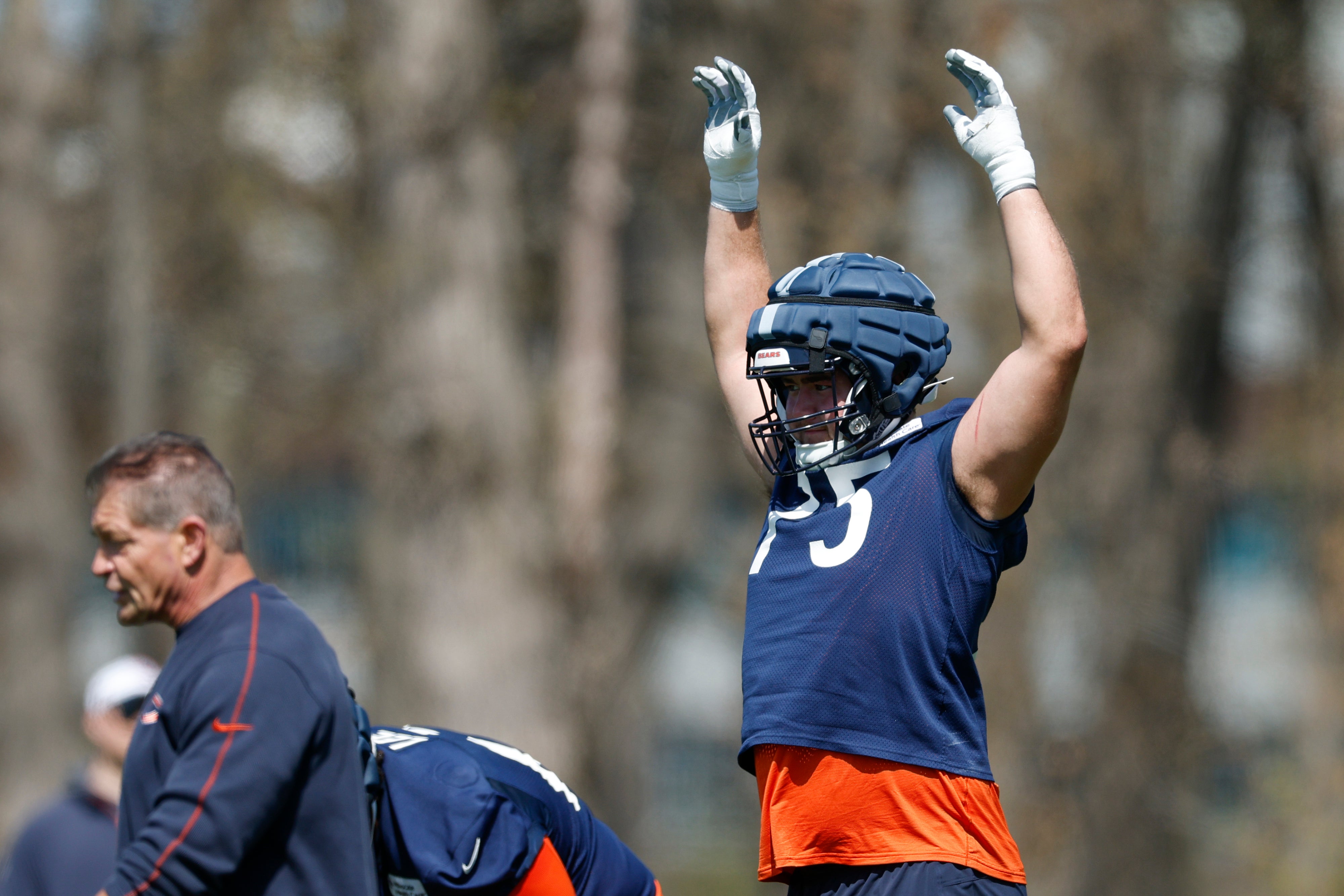 May 9, 2025; Lake Forest, IL, USA; Chicago Bears offensive line Ozzy Trapilo (75) warms up during the Rookie Minicamp at Halas Hall.
