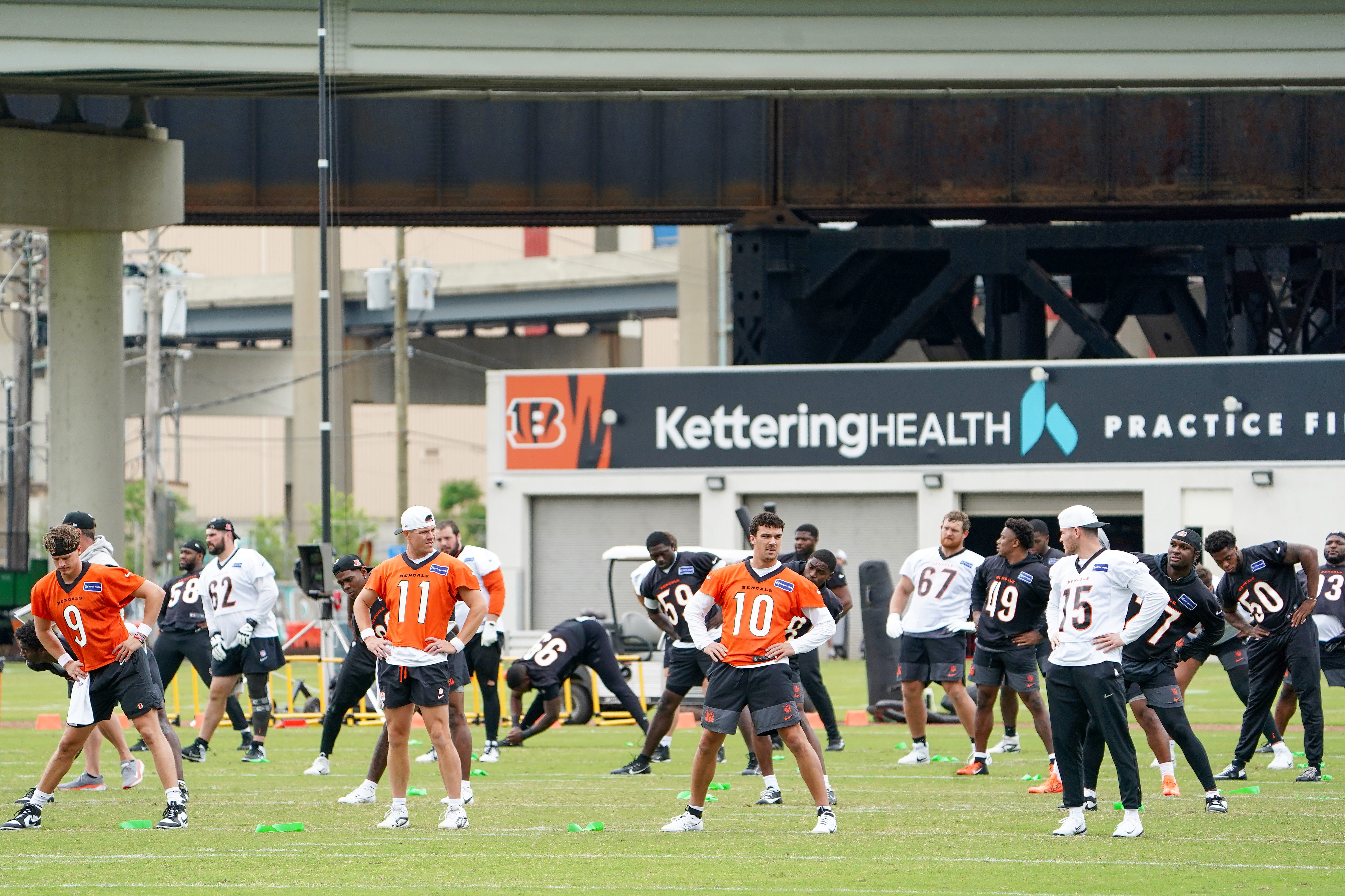 Cincinnati Bengals players warm-up during practice, Tuesday, May 13, 2025, at Kettering Health Practice Fields in Downtown Cincinnati.