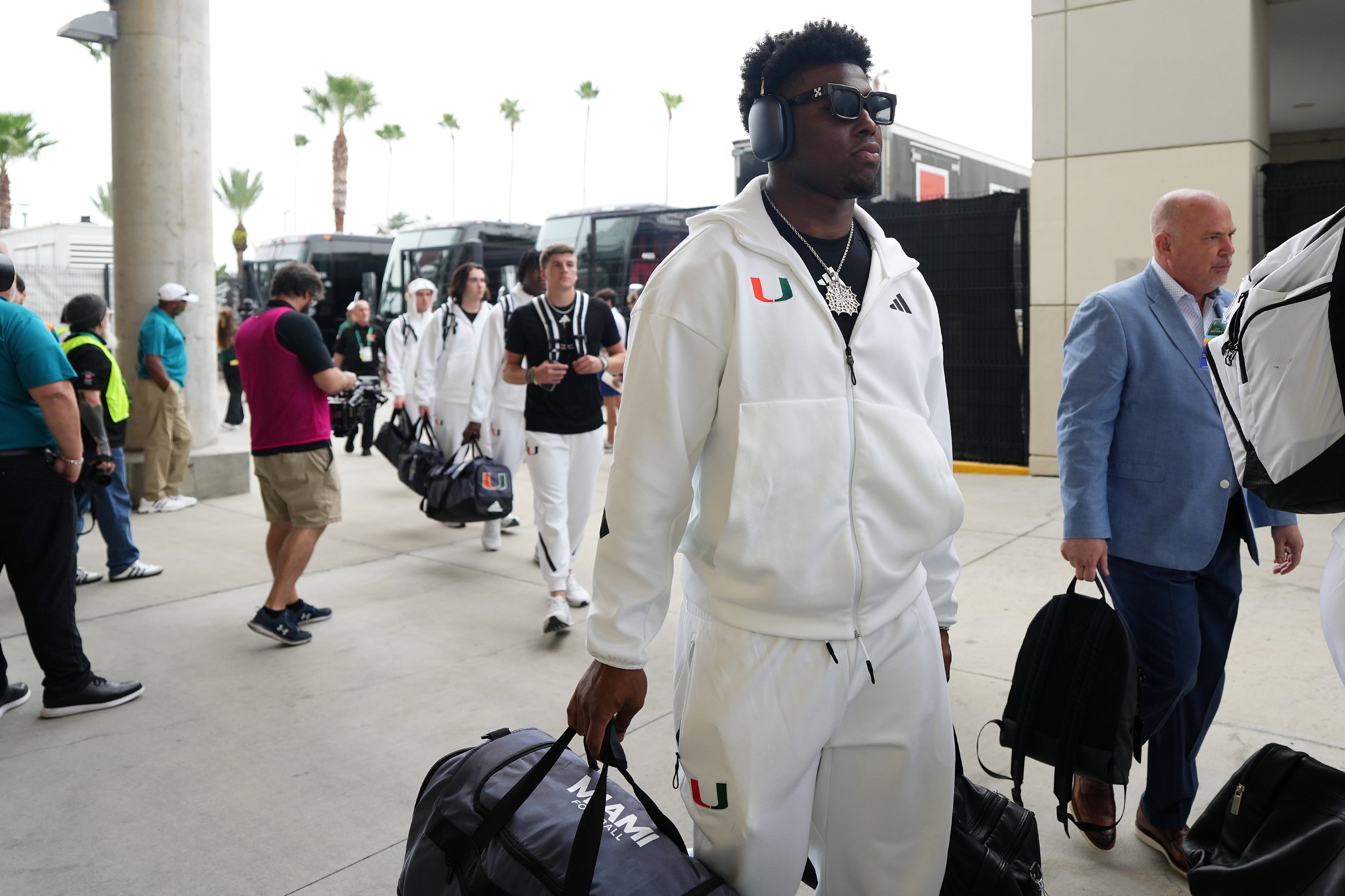 Miami Hurricanes wide receiver Sam Brown Jr. (11) arrives prior to the game against the Iowa State Cyclones at Camping World Stadium.