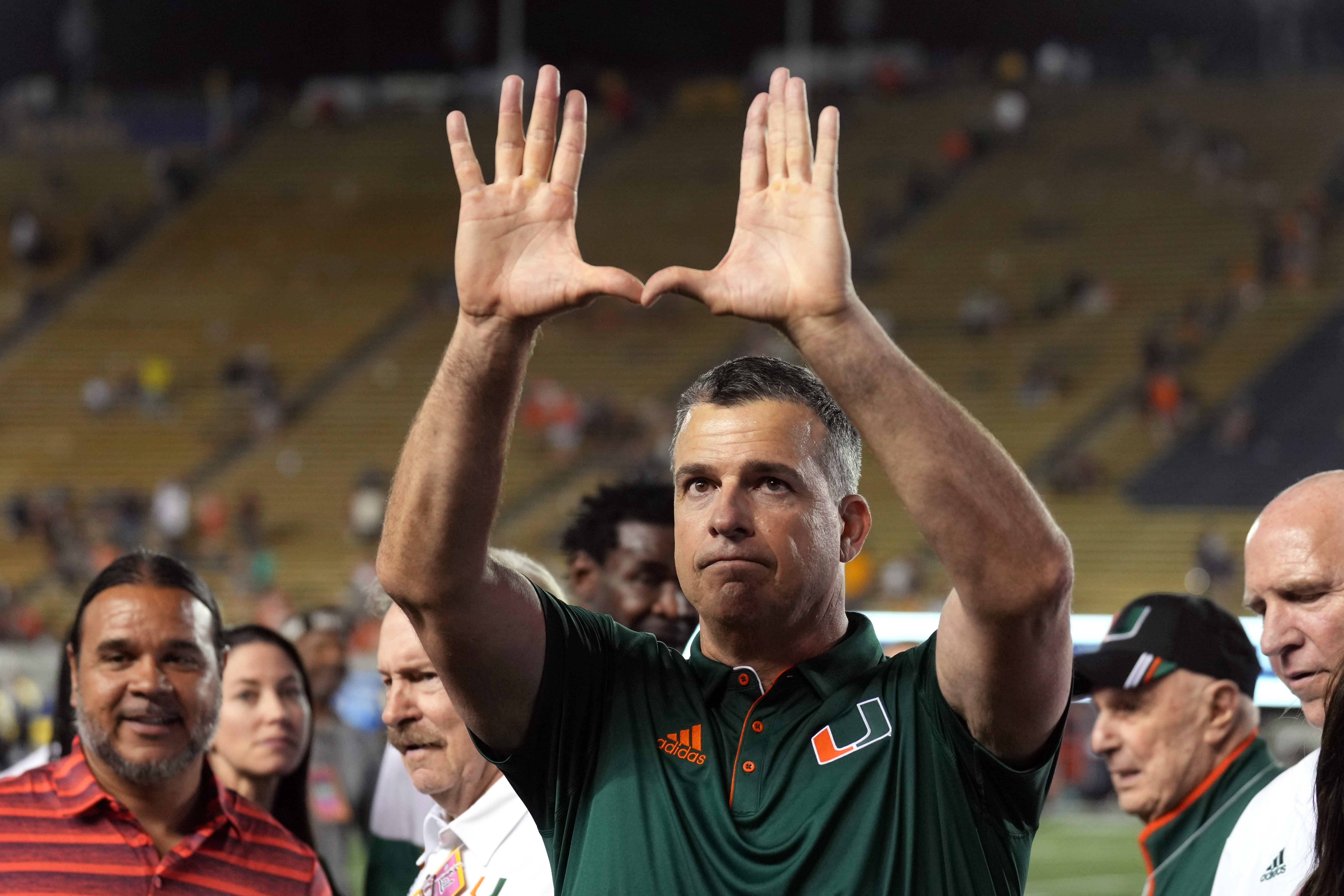 Oct 5, 2024; Berkeley, California, USA; Miami Hurricanes head coach Mario Cristobal gestures after defeating the California Golden Bears at California Memorial Stadium. Mandatory Credit: Darren Yamashita-Imagn Images  