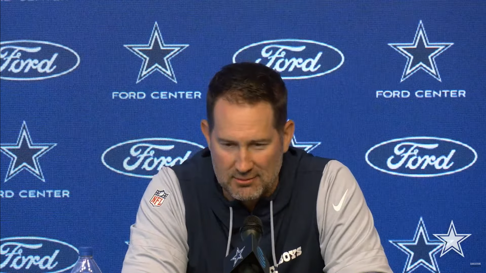 Dallas Cowboys HC Brian Schottenheimer talks to reporters during second week of OTAs.