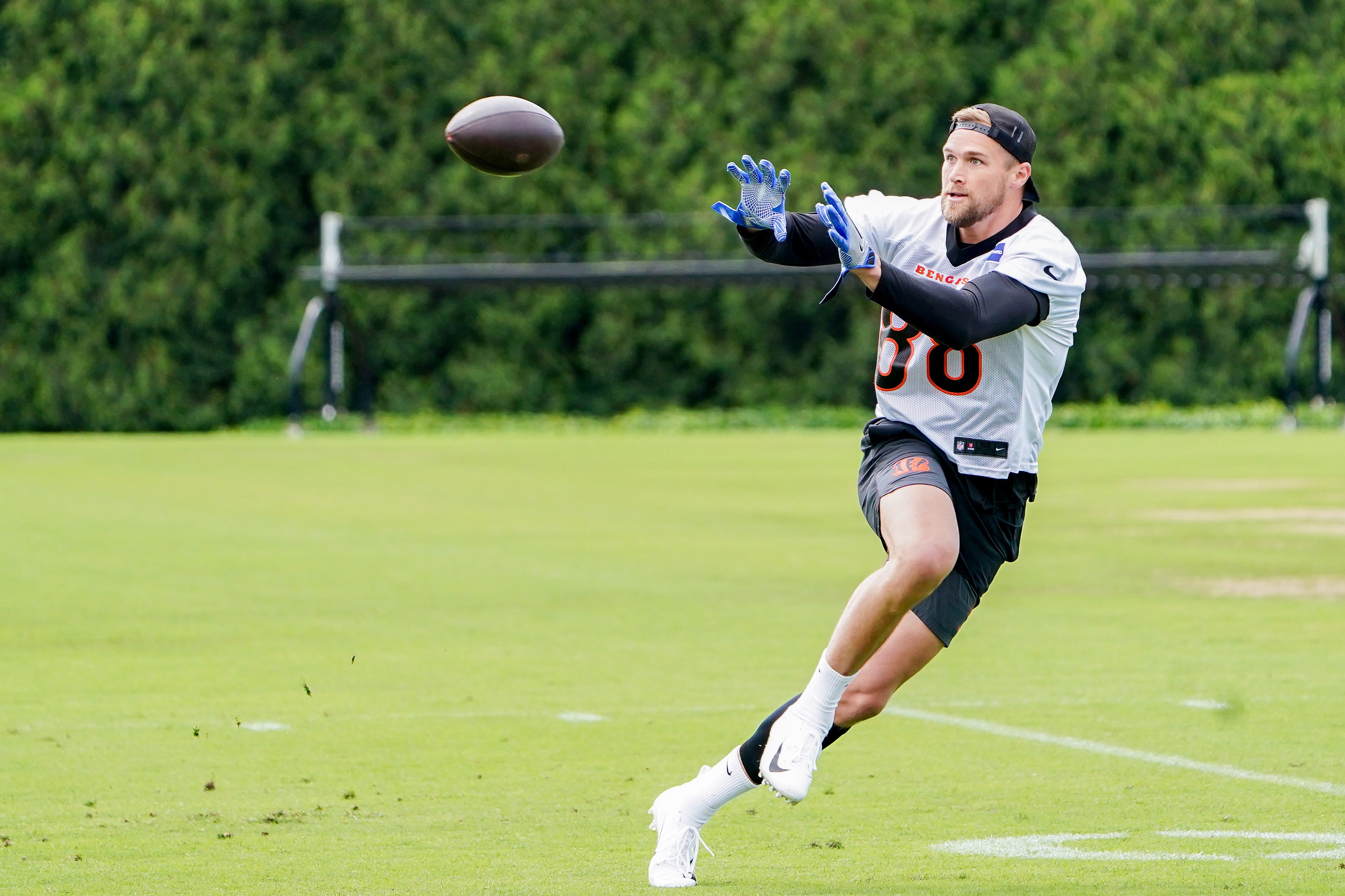 Cincinnati Bengals tight end Mike Gesicki (88) runs drills during practice, Tuesday, May 6, 2025, at the Kettering Health Practice Field in Downtown Cincinnati.  