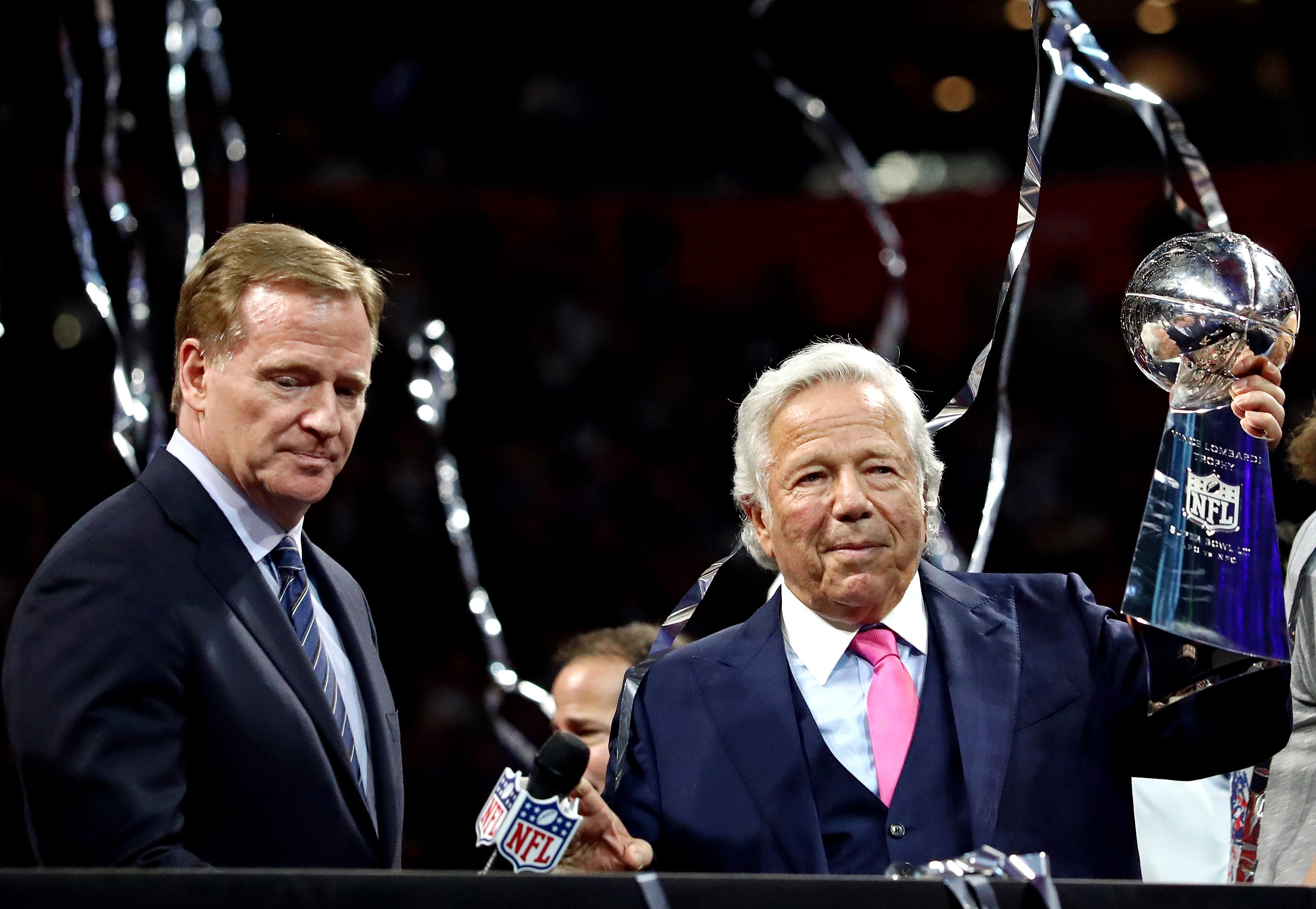 NFL commissioner Roger Goodell present New England Patriots owner Robert Kraft with the Vince Lombardi Trophy after the New England Patriots beat the Los Angeles Rams in Super Bowl LIII at Mercedes-Benz Stadium.