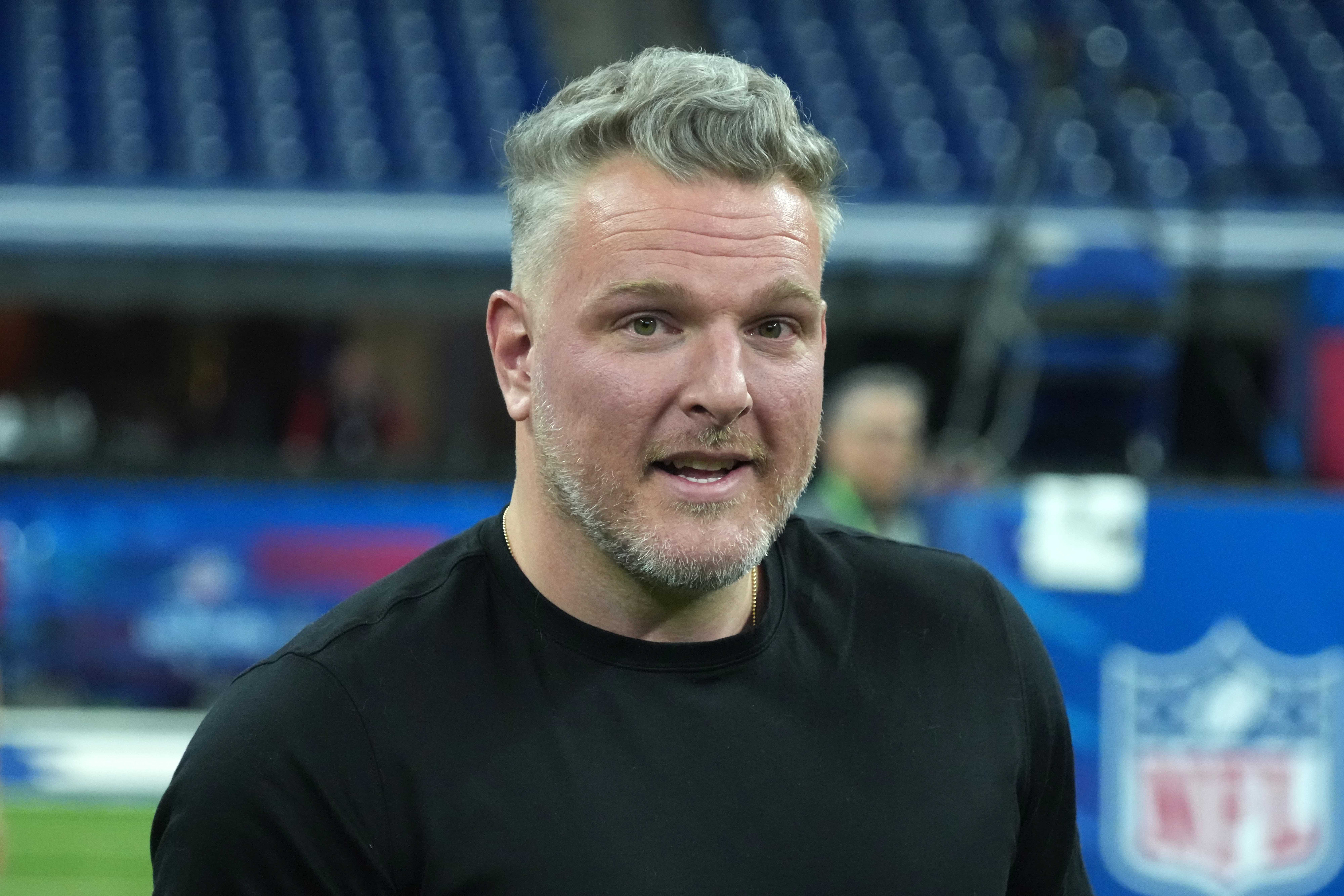 Feb 27, 2025; Indianapolis, IN, USA; Pat McAfee watches during workouts at the 2025 NFL Scouting Combine at Lucas Oil Stadium.