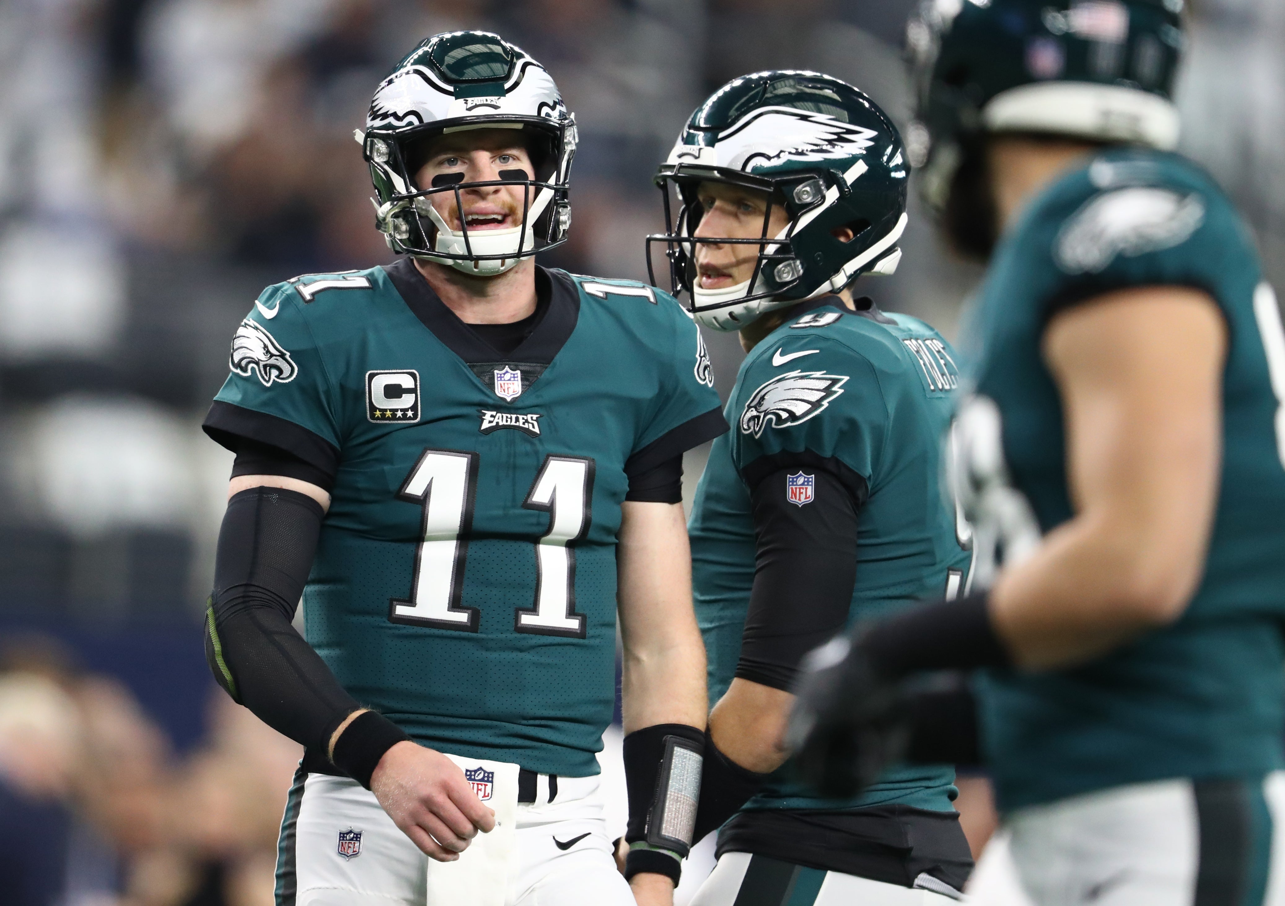 Dec 9, 2018; Arlington, TX, USA; Philadelphia Eagles quarterback Carson Wentz (11) and Nick Foles (9) prior to the game against the Dallas Cowboys at AT&T Stadium. Mandatory Credit: Matthew Emmons-Imagn Images  
