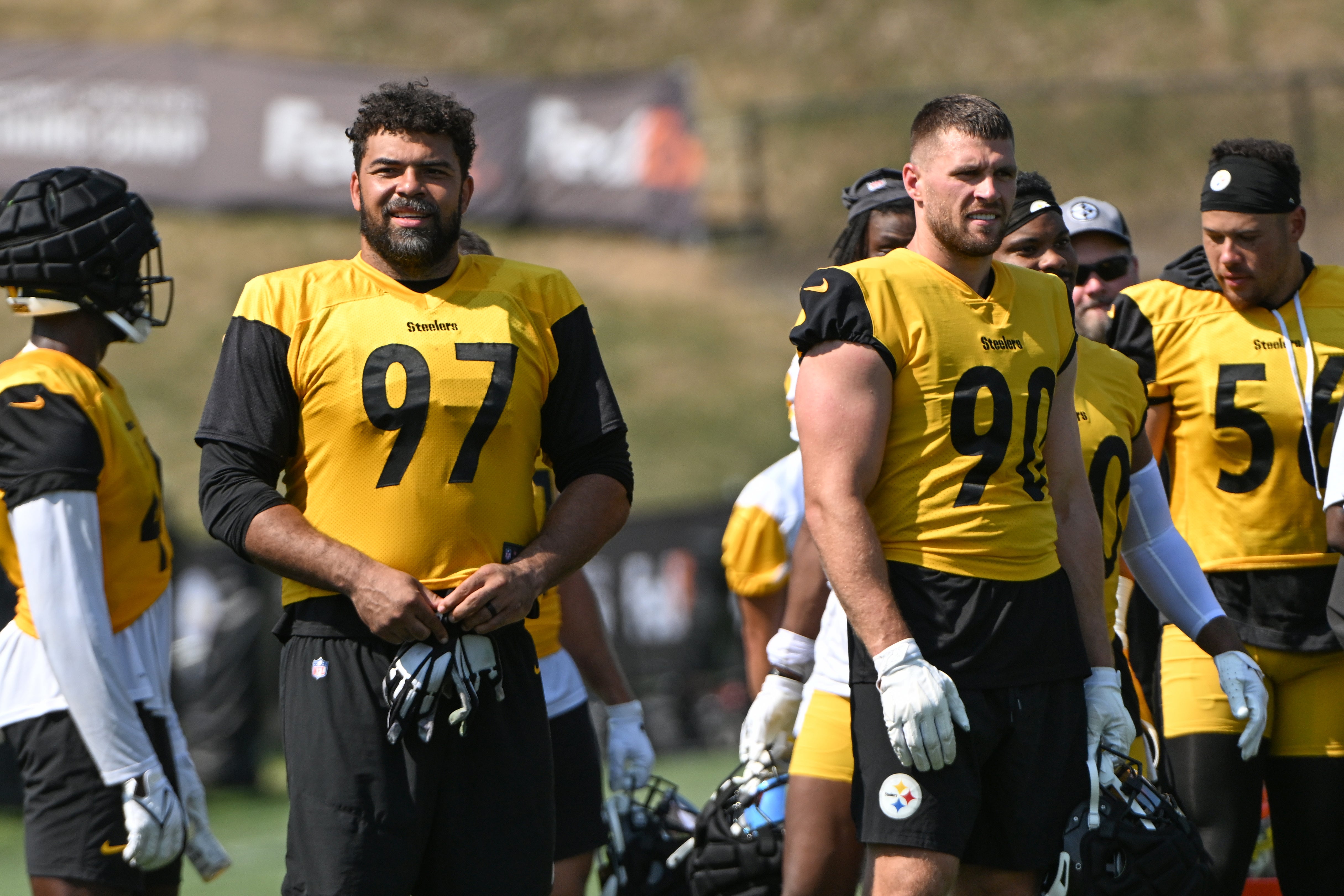 Jul 28, 2024; Latrobe, PA, USA; Pittsburgh Steelers defensive tackle Cameron Heyward (97) and linebacker T.J. Watt (90) participate in drills during training camp at Saint Vincent College.