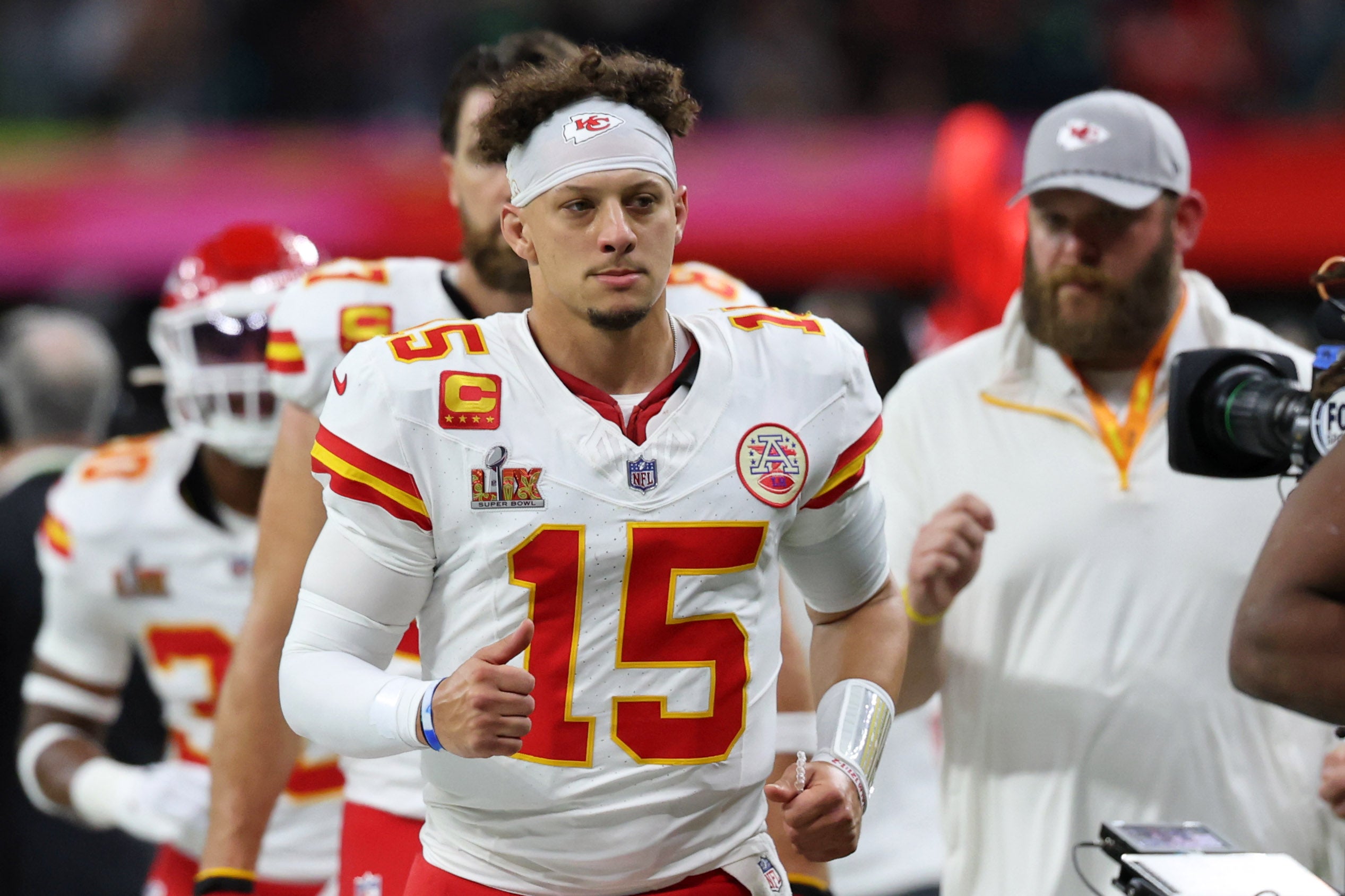 Kansas City Chiefs quarterback Patrick Mahomes (15) walks off the field at the end of the first half of Super Bowl LIX