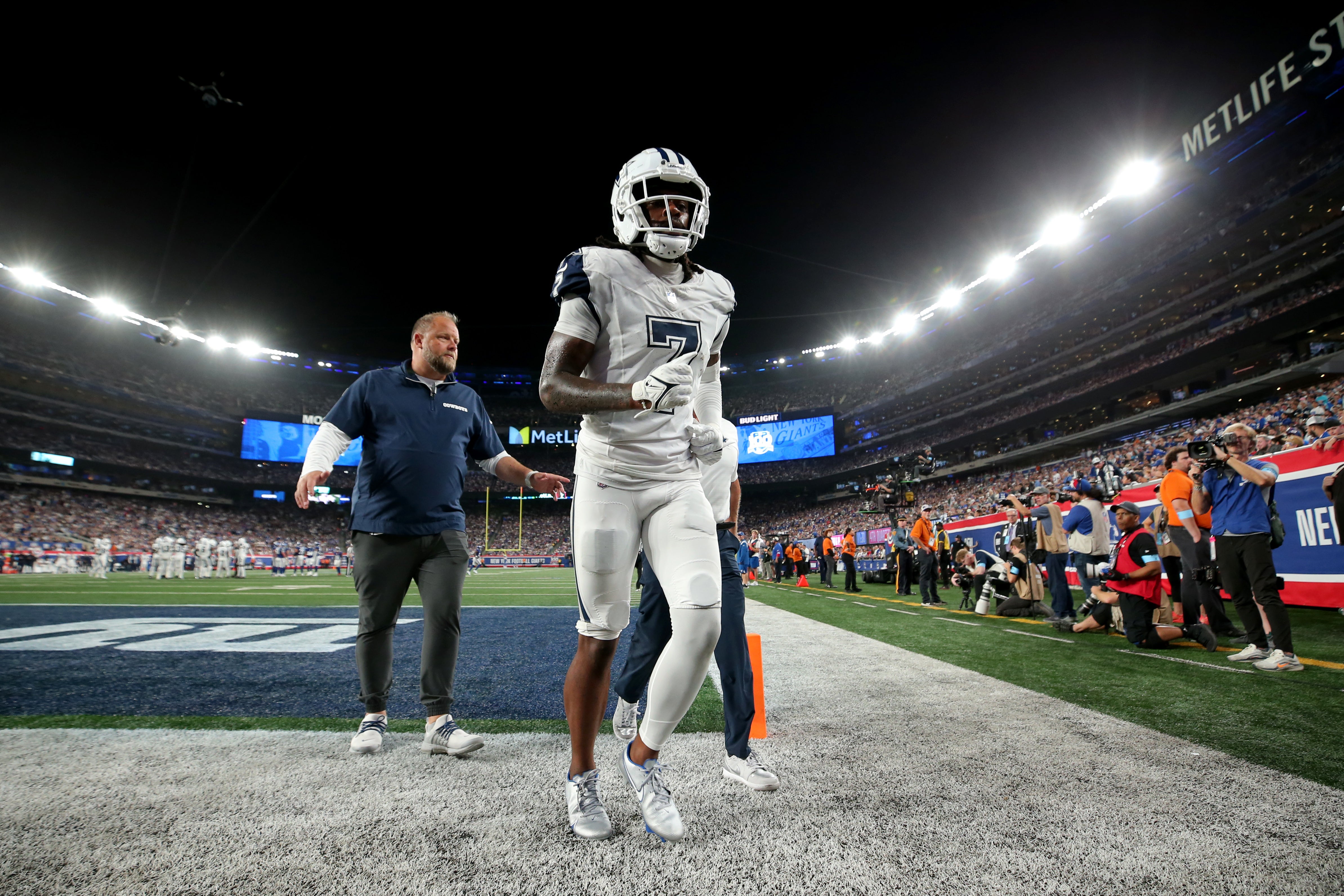 Dallas Cowboys cornerback Trevon Diggs (7) leaves the field after an injury during the fourth quarter against the New York Giants at MetLife Stadium.