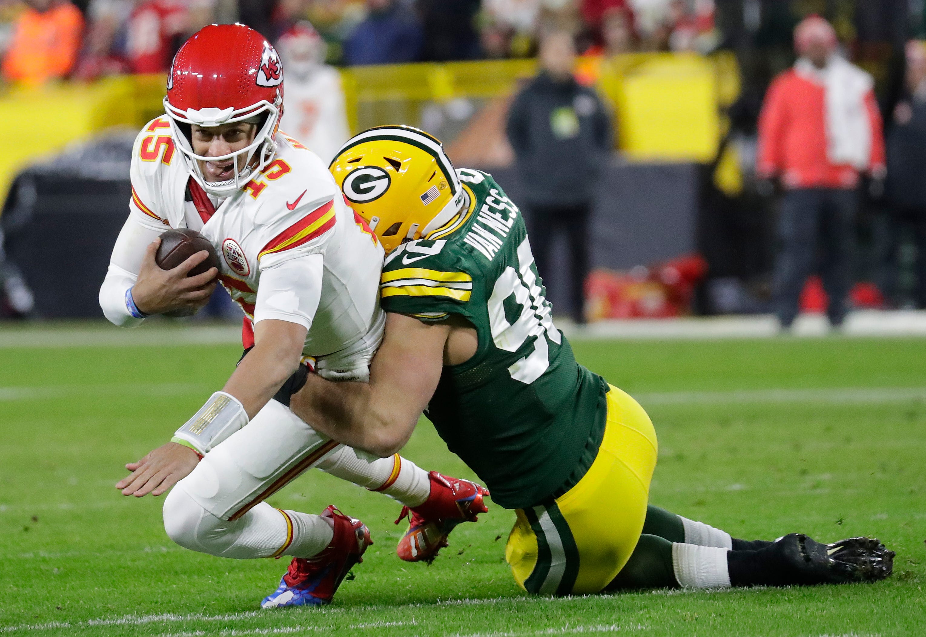 Green Bay Packers linebacker Lukas Van Ness (90) sacks Kansas City Chiefs quarterback Patrick Mahomes (15) during their football game Sunday, December 3, 2023, at Lambeau Field in Green Bay, Wis.