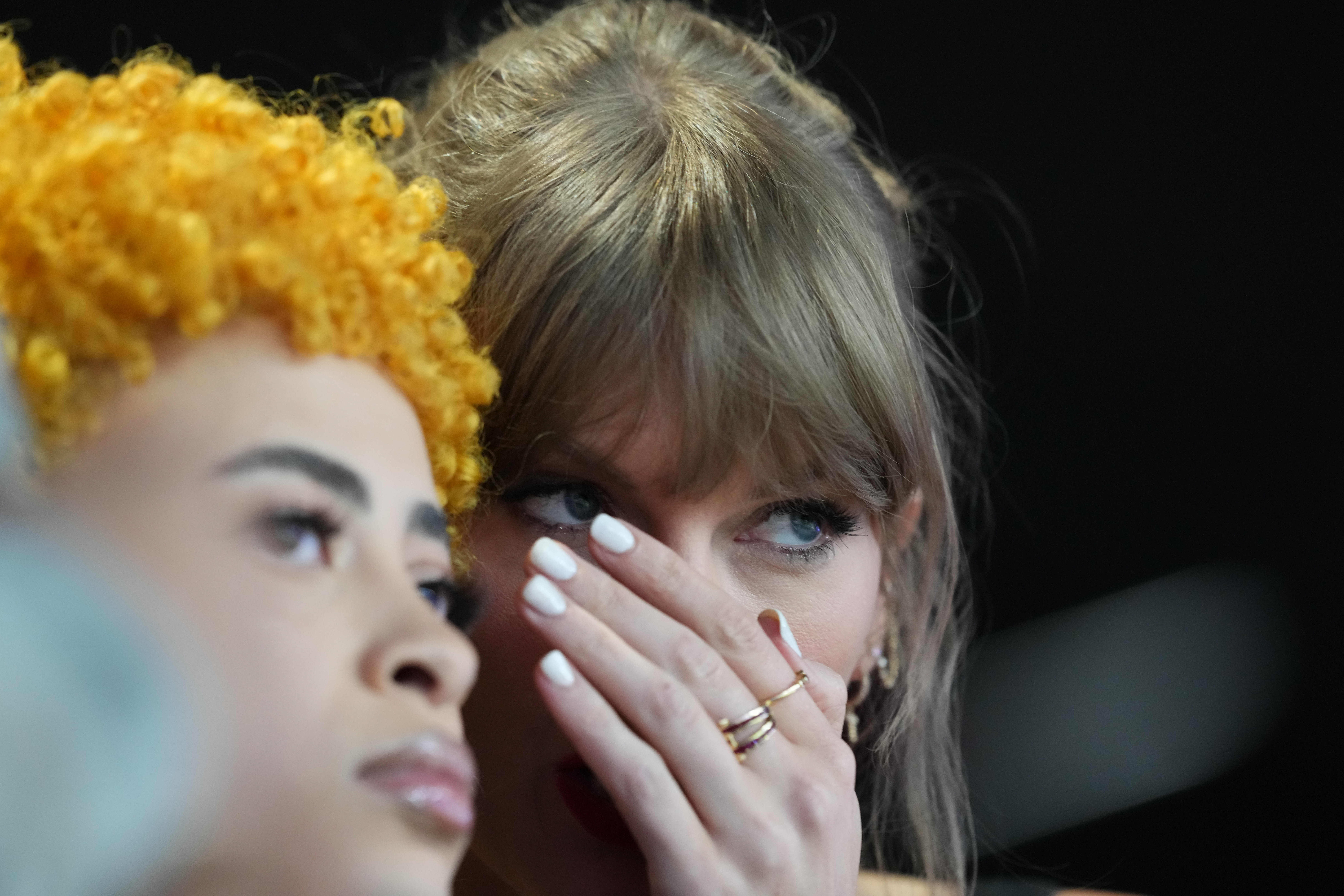 Feb 11, 2024; Paradise, Nevada, USA; Recording artist Taylor Swift pictured with Ice Spice reacts during the first quarter of Super Bowl LVIII between Kansas City Chiefs and San Francisco 49ers at Allegiant Stadium.
