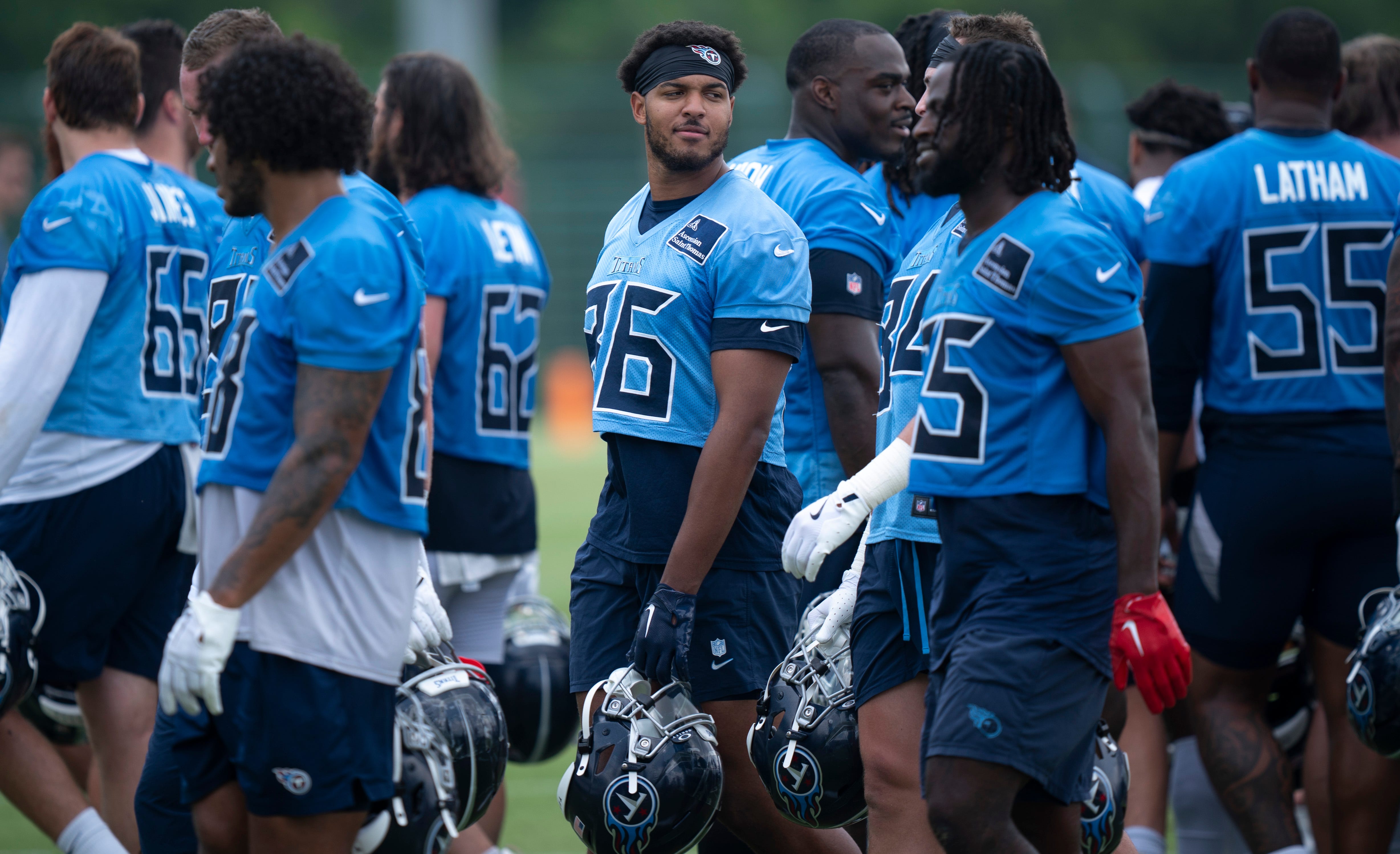 Tennessee Titans tight ends Drake Dabney (86) and Chig Okonkwo (85) head off the field after OTAs at Ascension Saint Thomas Sports Park in Nashville, Tenn., Tuesday, June 3, 2025.