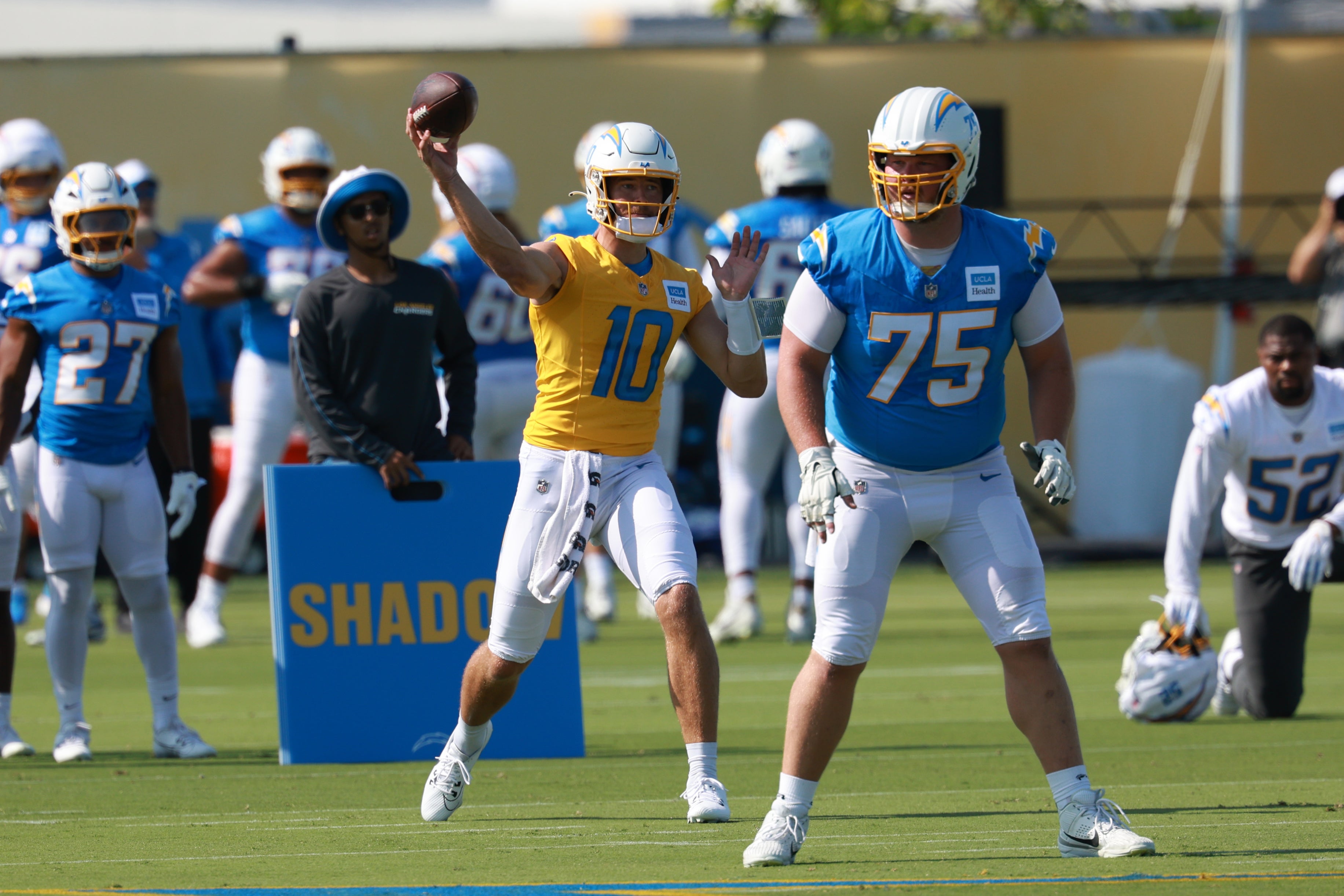 Los Angeles Chargers quarterback Justin Herbert (10) throws during training camp.