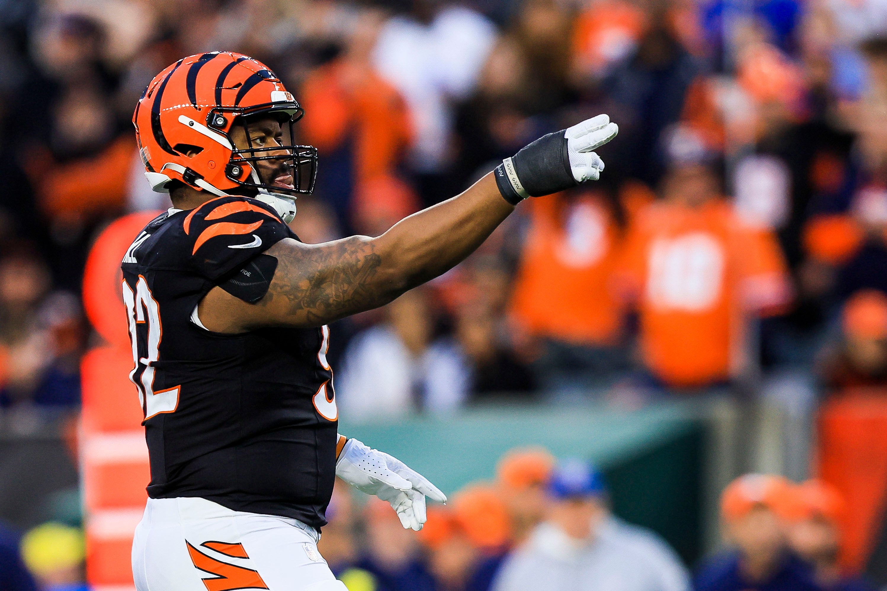 Dec 28, 2024; Cincinnati, Ohio, USA; Cincinnati Bengals defensive tackle B.J. Hill (92) reacts after a play against the Denver Broncos in the first half at Paycor Stadium.