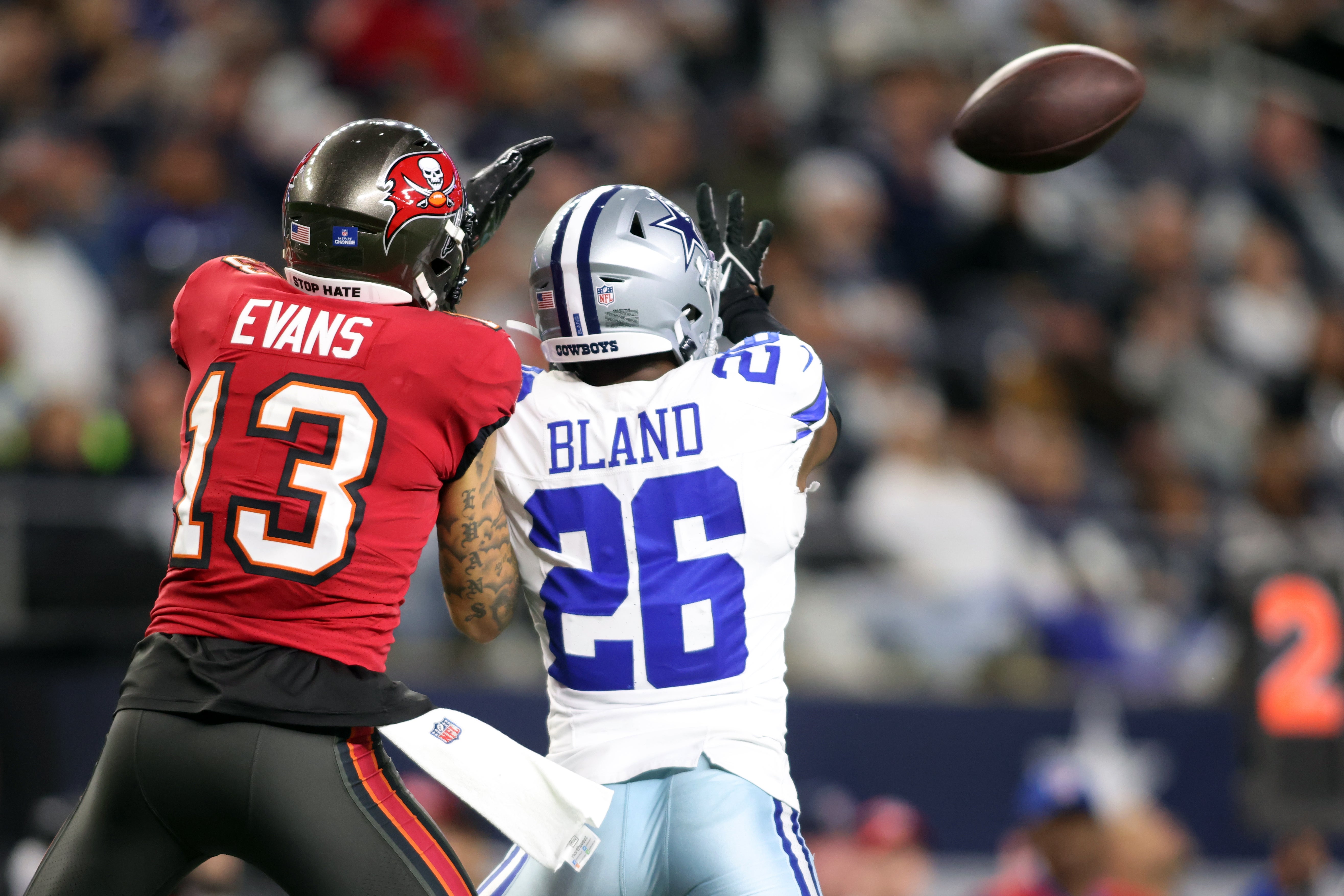 Dallas Cowboys cornerback DaRon Bland (26) defends a pass against Tampa Bay Buccaneers wide receiver Mike Evans (13) in the third quarter at AT&T Stadium.