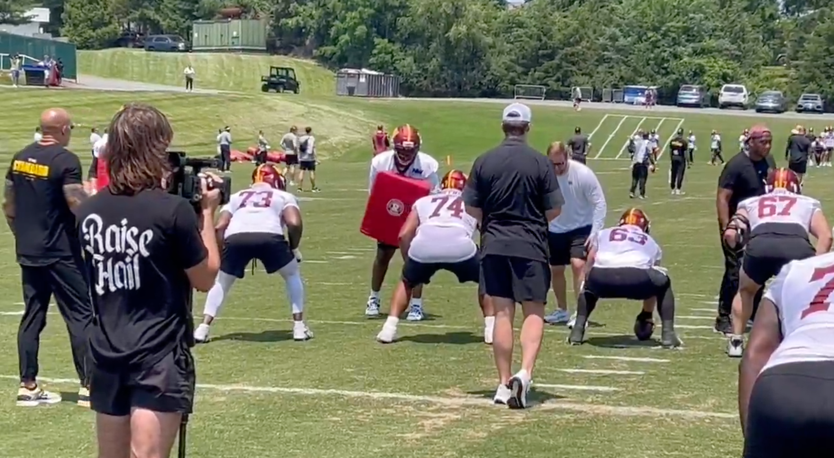 Commanders offensive line practices during OTAs.