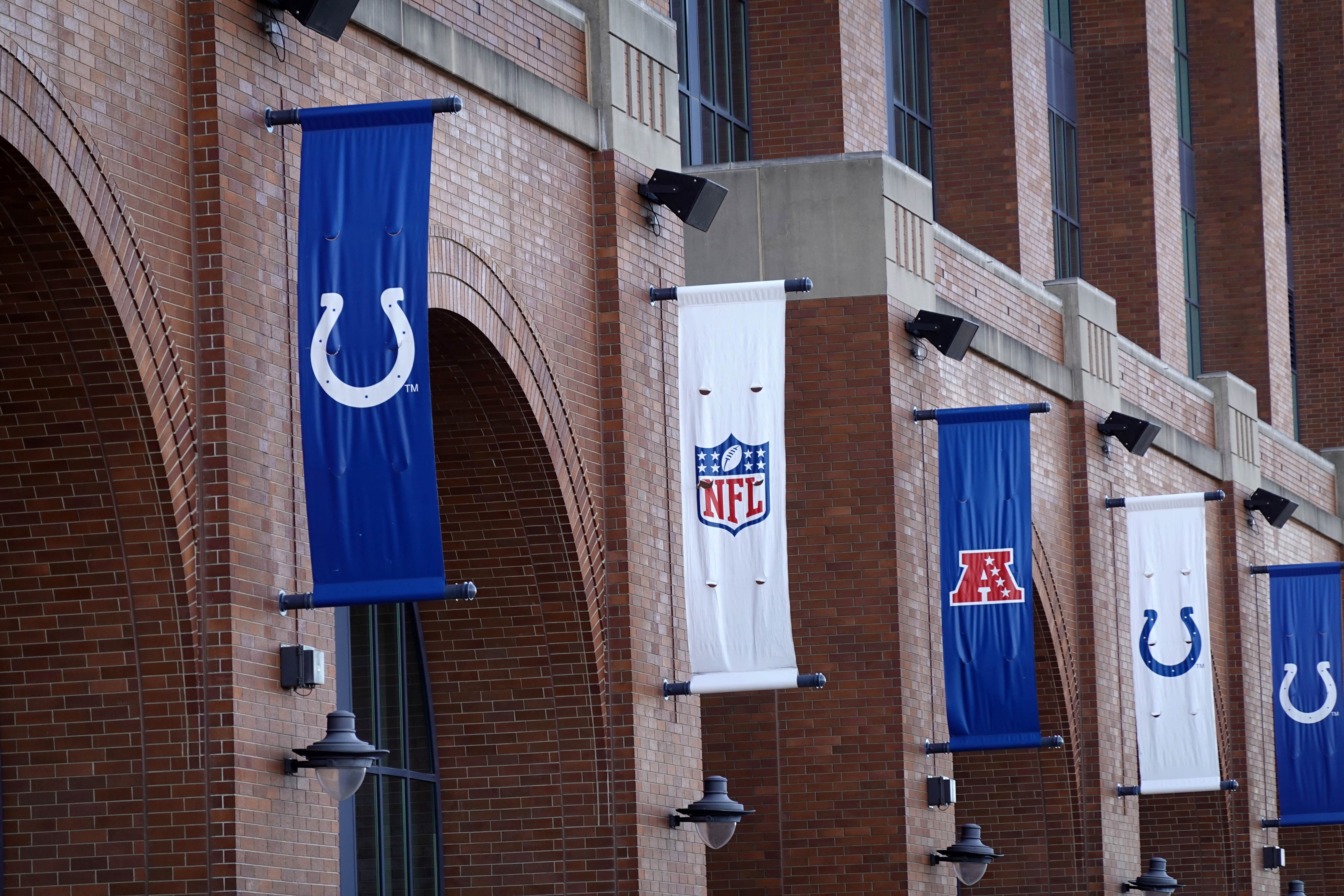 Feb 28, 2025; Indianapolis, IN, USA; Indianapolis Colts, NFL shield logo and AFC banners at Lucas Oil Stadium.