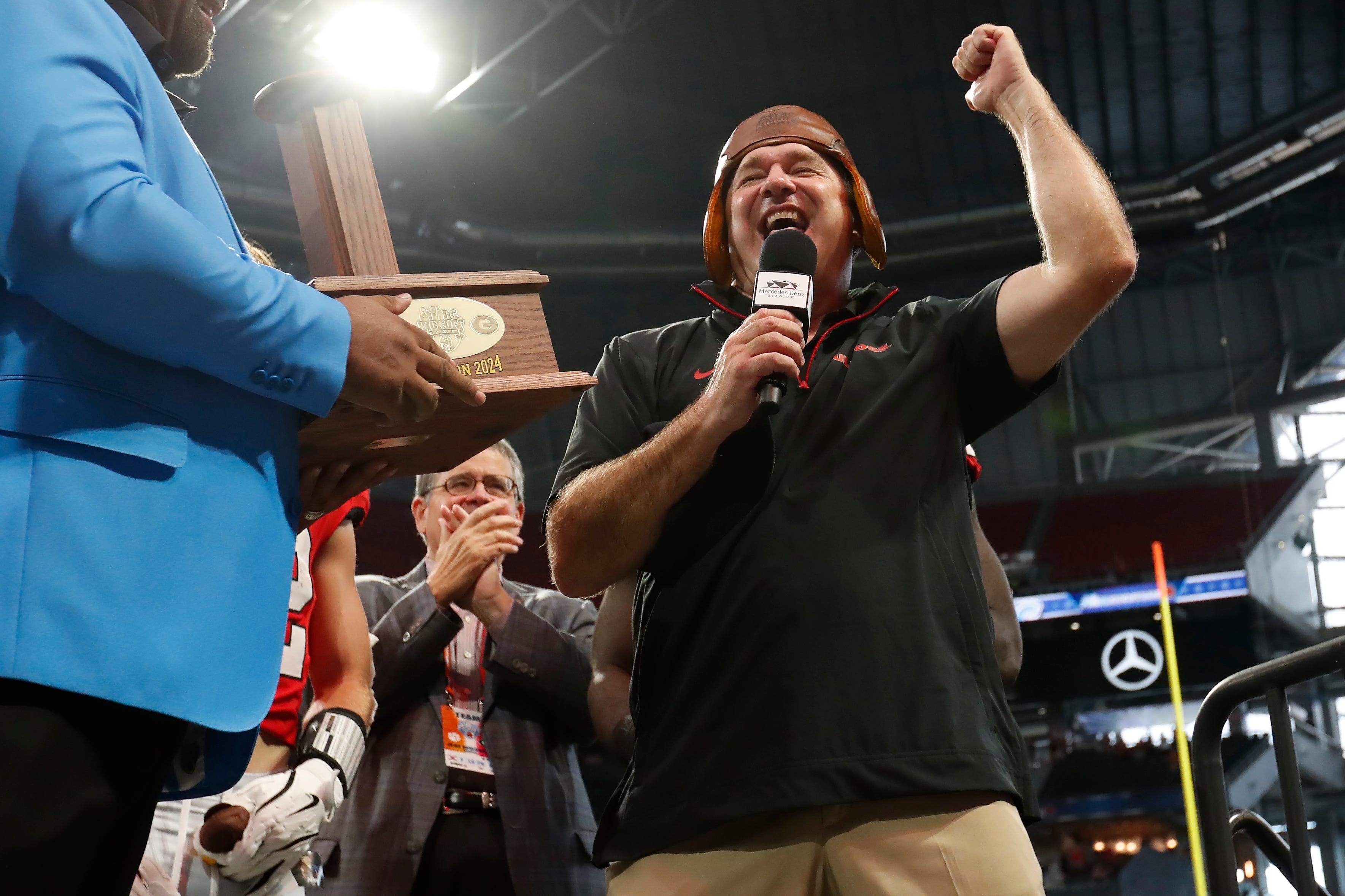 Georgia coach Kirby Smart celebrates after winning the NCAA Aflac Kickoff Game in Atlanta, on Saturday, Aug. 31, 2024. Georgia won 34-3.