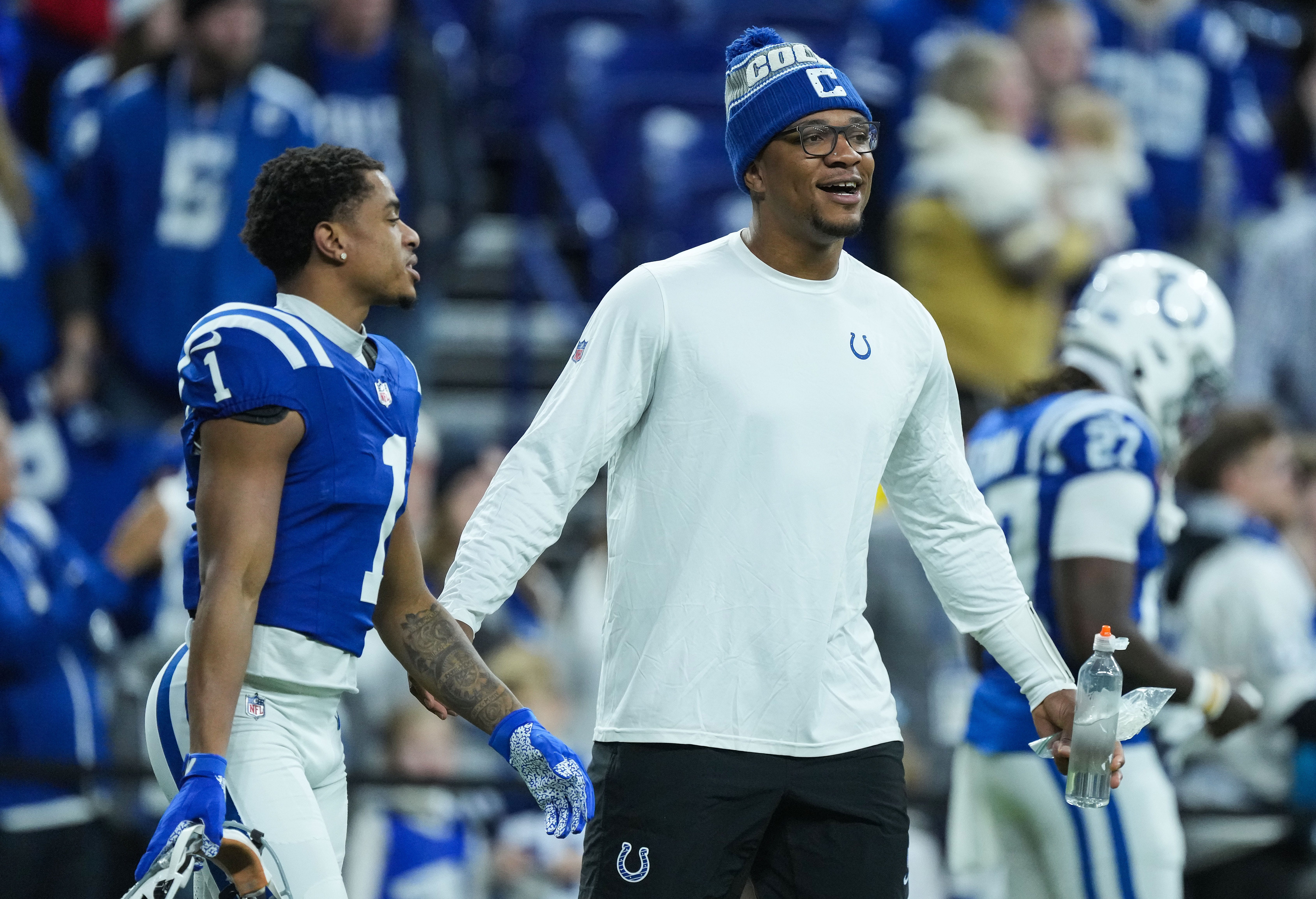 Indianapolis Colts quarterback Anthony Richardson (5) talks to Indianapolis Colts wide receiver Josh Downs (1) on Sunday, Jan. 5, 2025, during pregame warm-up at Lucas Oil Stadium in Indianapolis.
