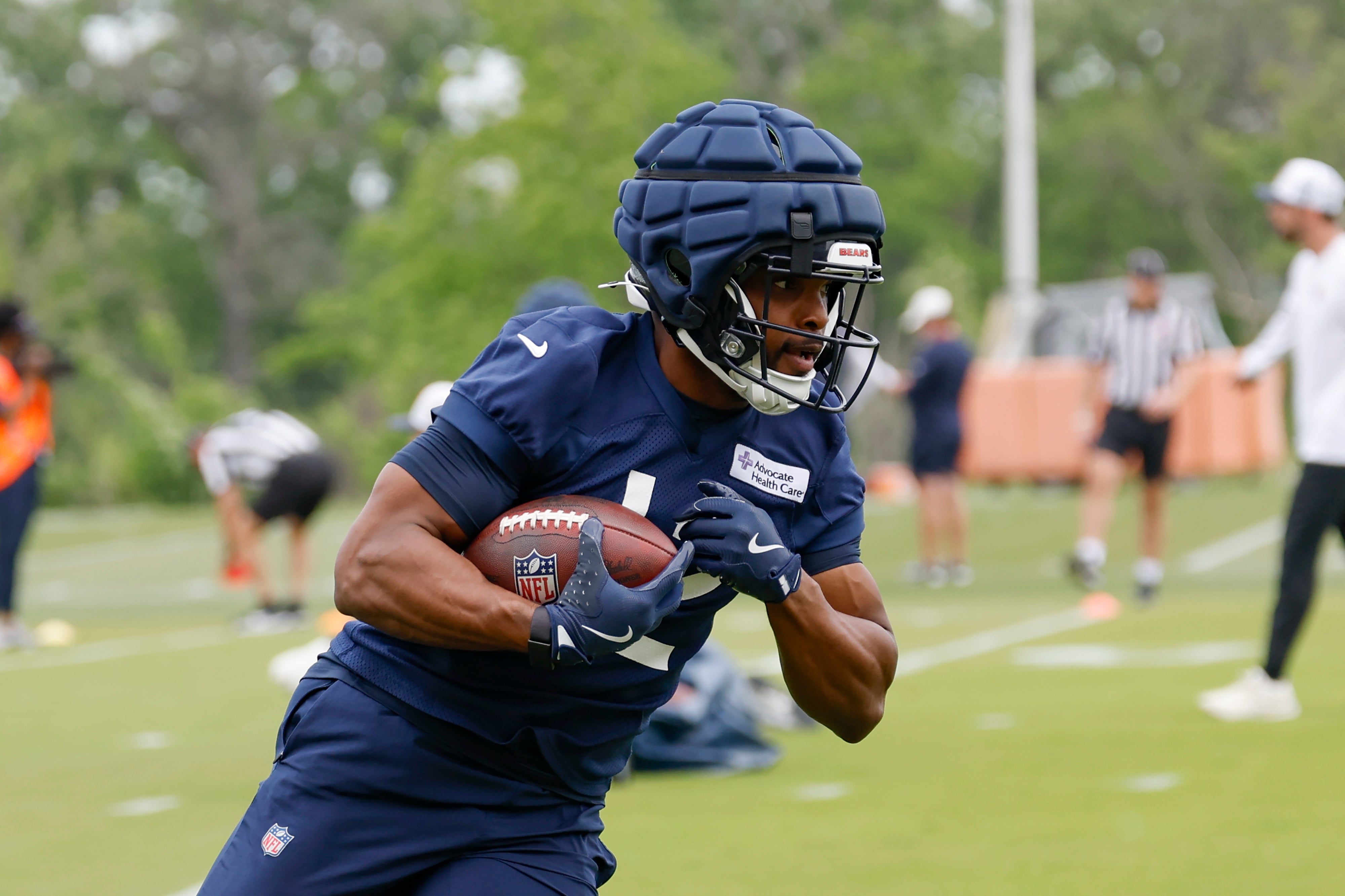 Devin Duvernay (12) runs with the ball during minicamp at Halas Hall.