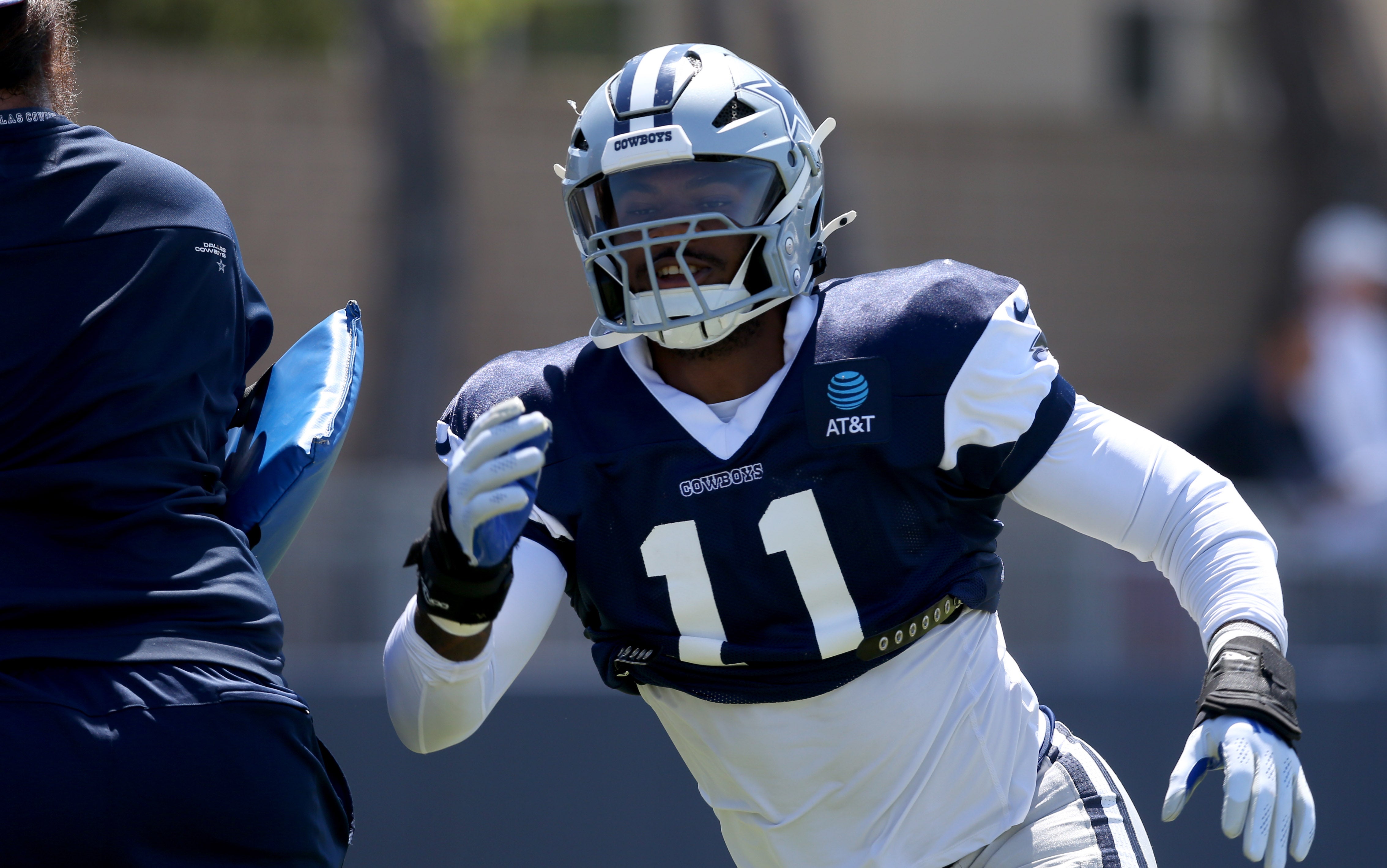 Dallas Cowboys linebacker Micah Parsons (11) runs a drill during training camp at the River Ridge Playing Fields in Oxnard, California.