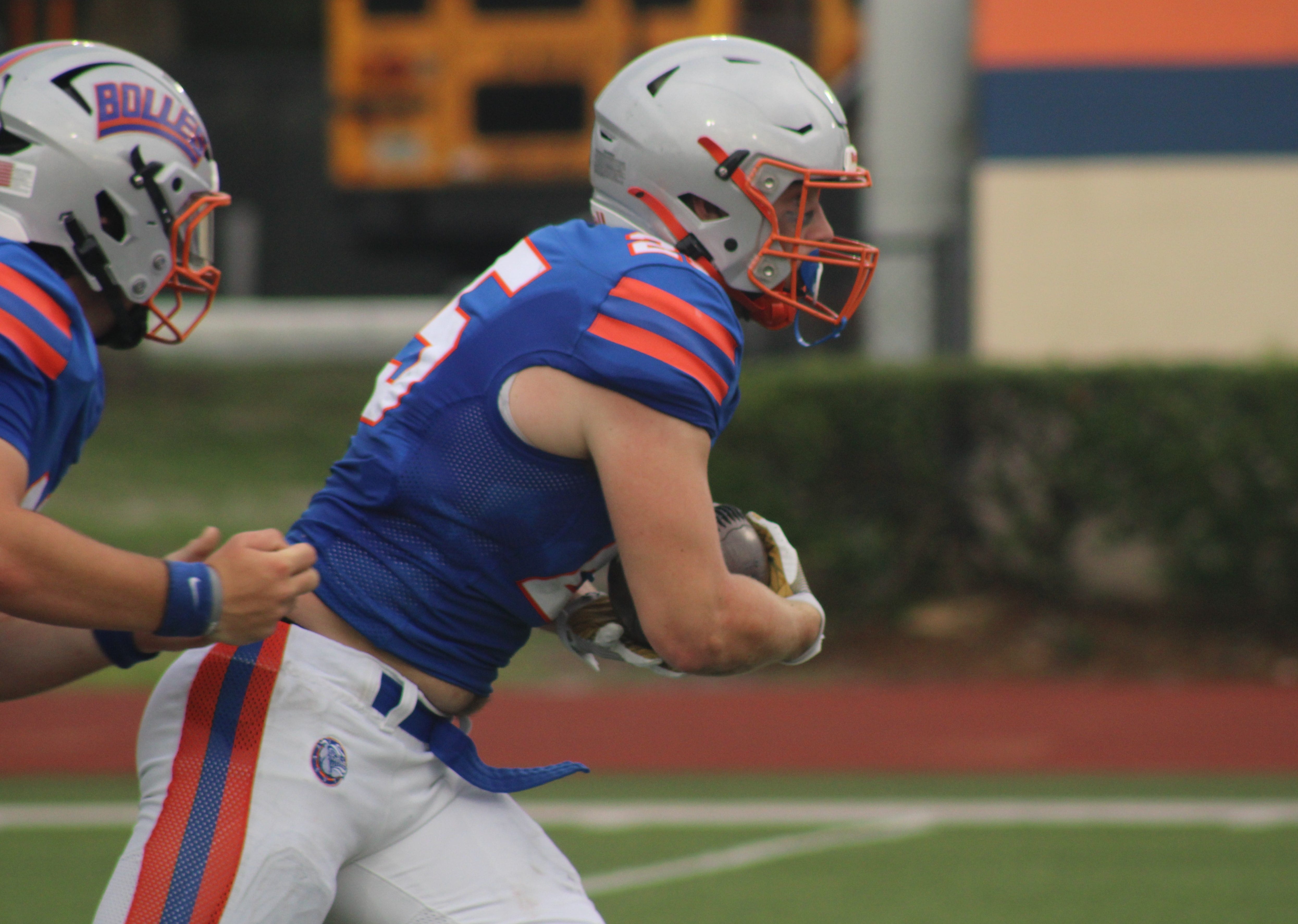 Bolles running back Xander Edwards (25) rushes for yardage against Mandarin during a high school spring football game on May 22, 2025. [Clayton Freeman/Florida Times-Union]