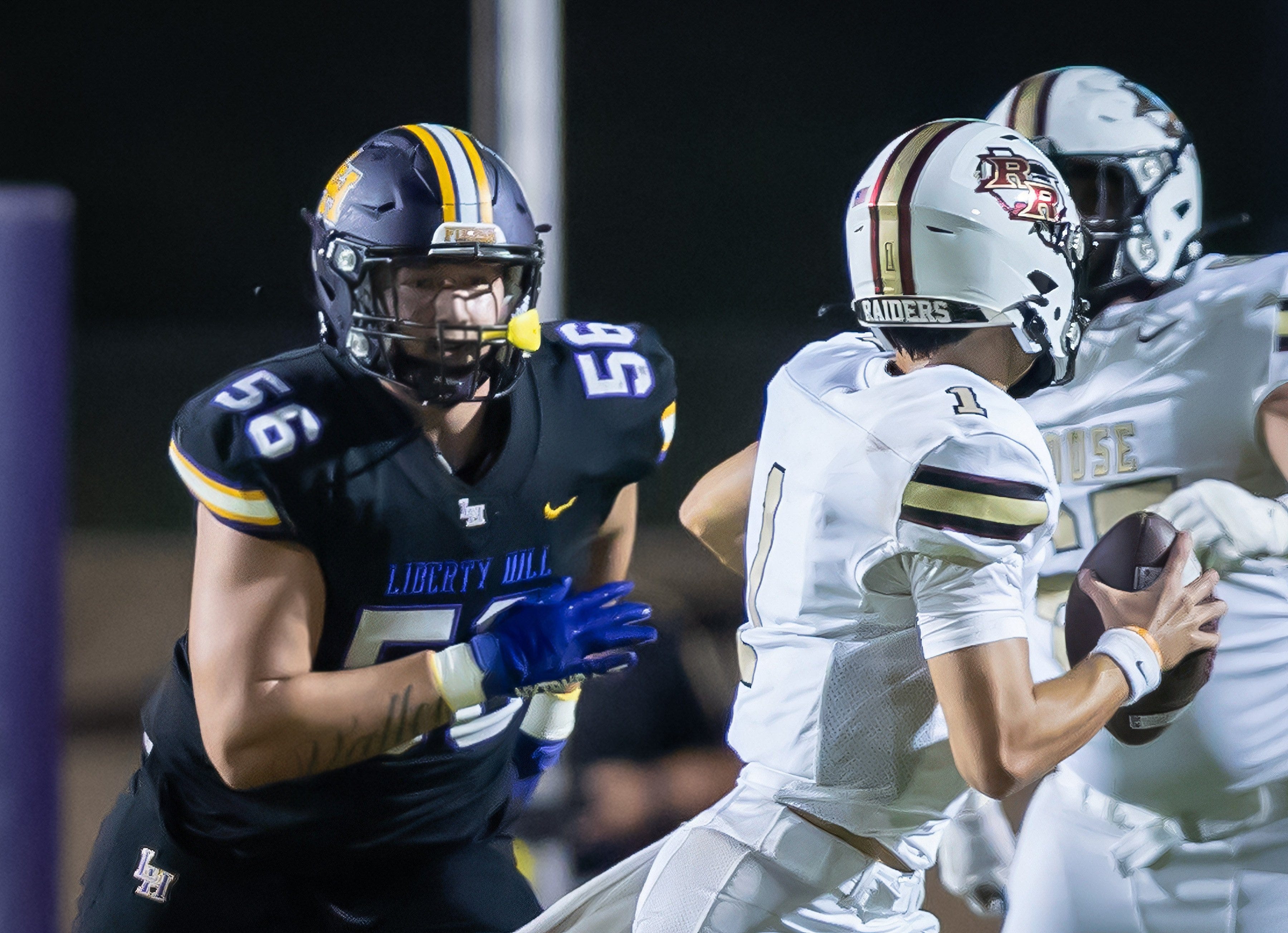 Liberty Hill Panthers defensive end Alister Vallejo (56) chases Rouse Raiders quarterback London Morgan (1) during a play in the fourth quarter at the non-district Class 5A football game on Friday, Sept 6, 2024, at Liberty Hill Panther Stadium in Liberty Hill, TX.
