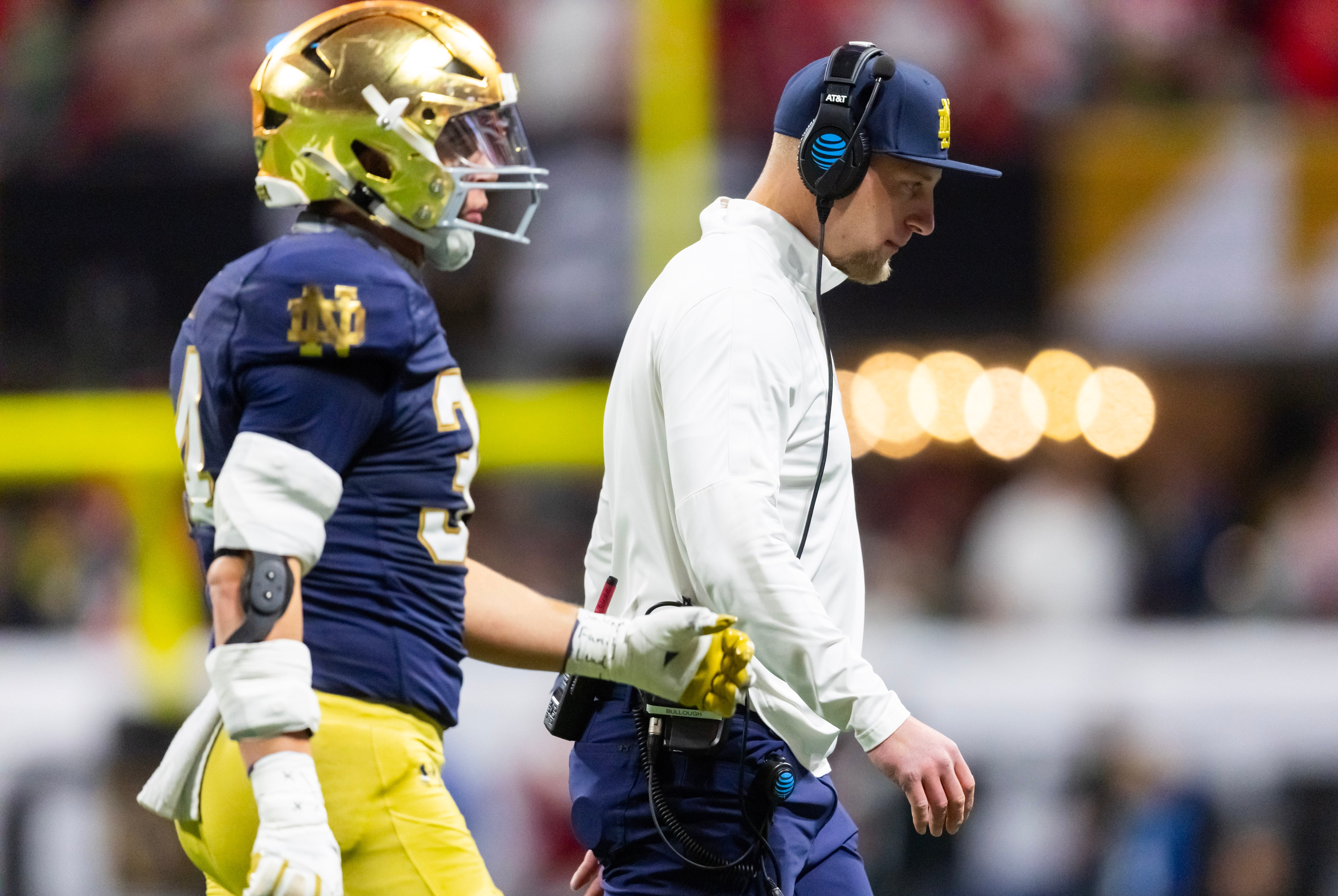 Jan 20, 2025; Atlanta, GA, USA; Notre Dame Fighting Irish linebackers coach Max Bullough against the Ohio State Buckeyes during the CFP National Championship college football game at Mercedes-Benz Stadium. Mandatory Credit: Mark J. Rebilas-Imagn Images