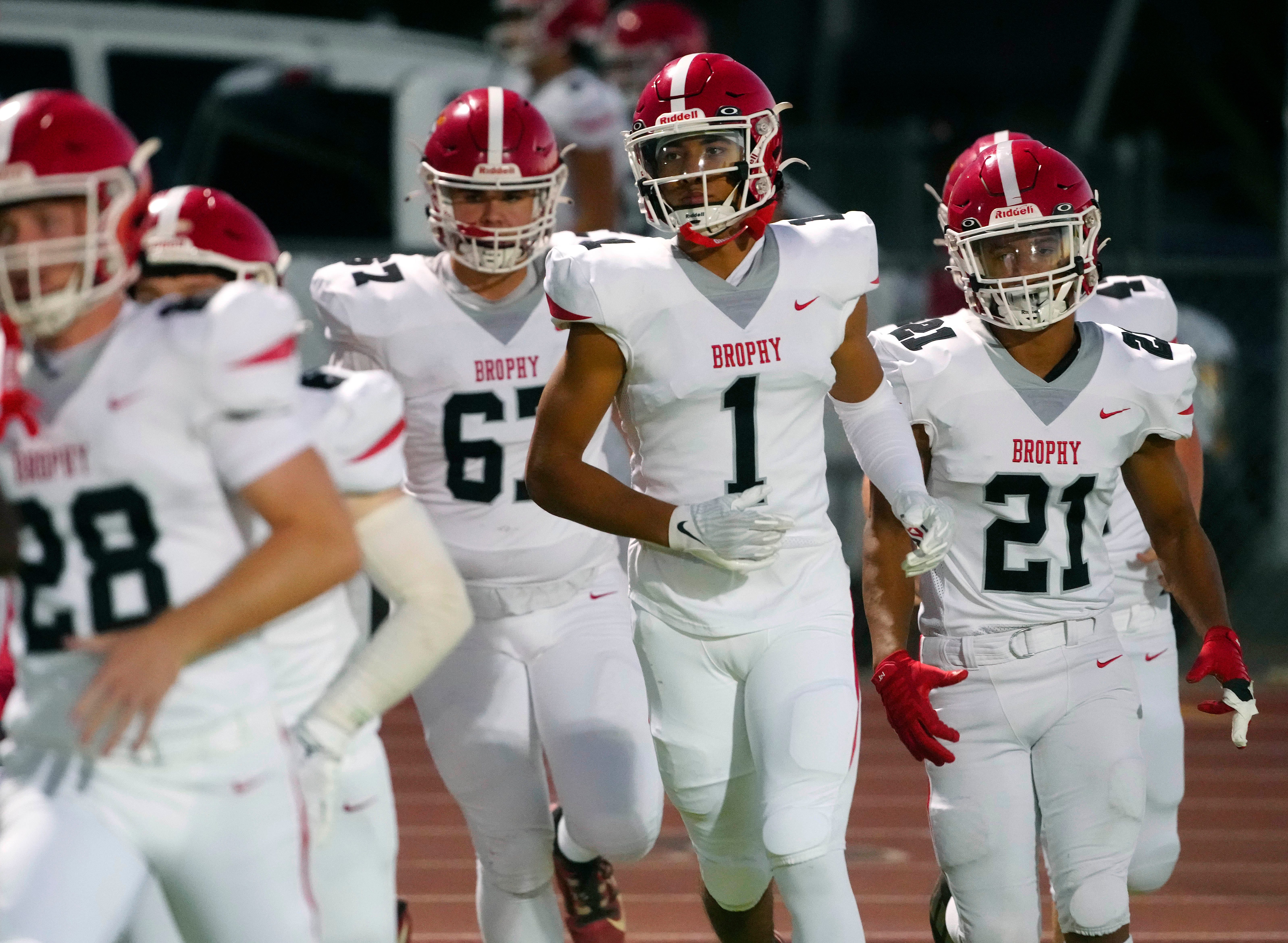 Brophy Prep wide receiver Devin Fitzgerald (1) takes the field with his team during a game at Centennial High School on Sept. 13, 2024.