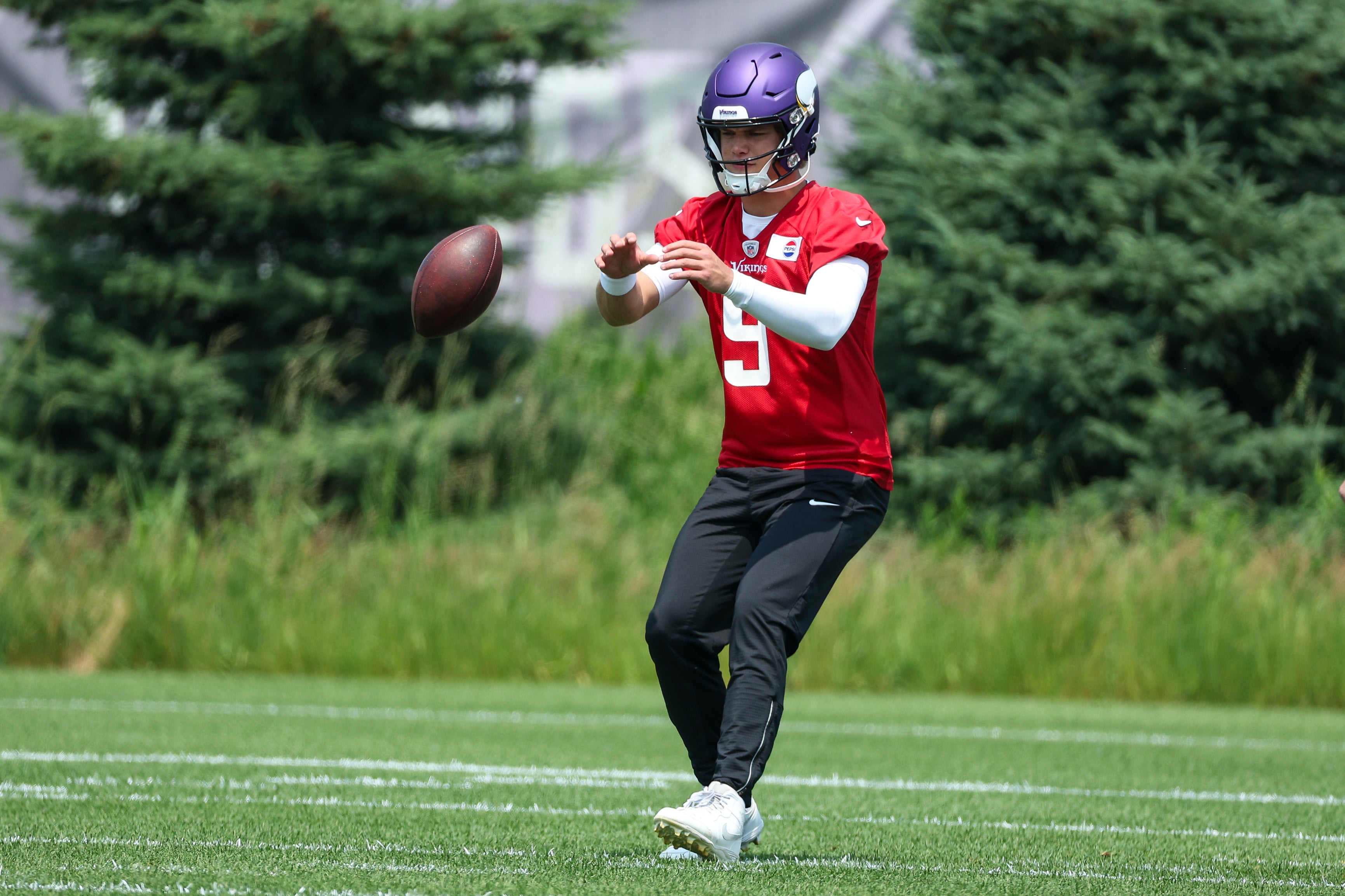 Jun 10, 2025; Minneapolis, MN, USA; Minnesota Vikings quarterback J.J. McCarthy (9) practices during minicamp at the Minnesota Vikings Training Facility.