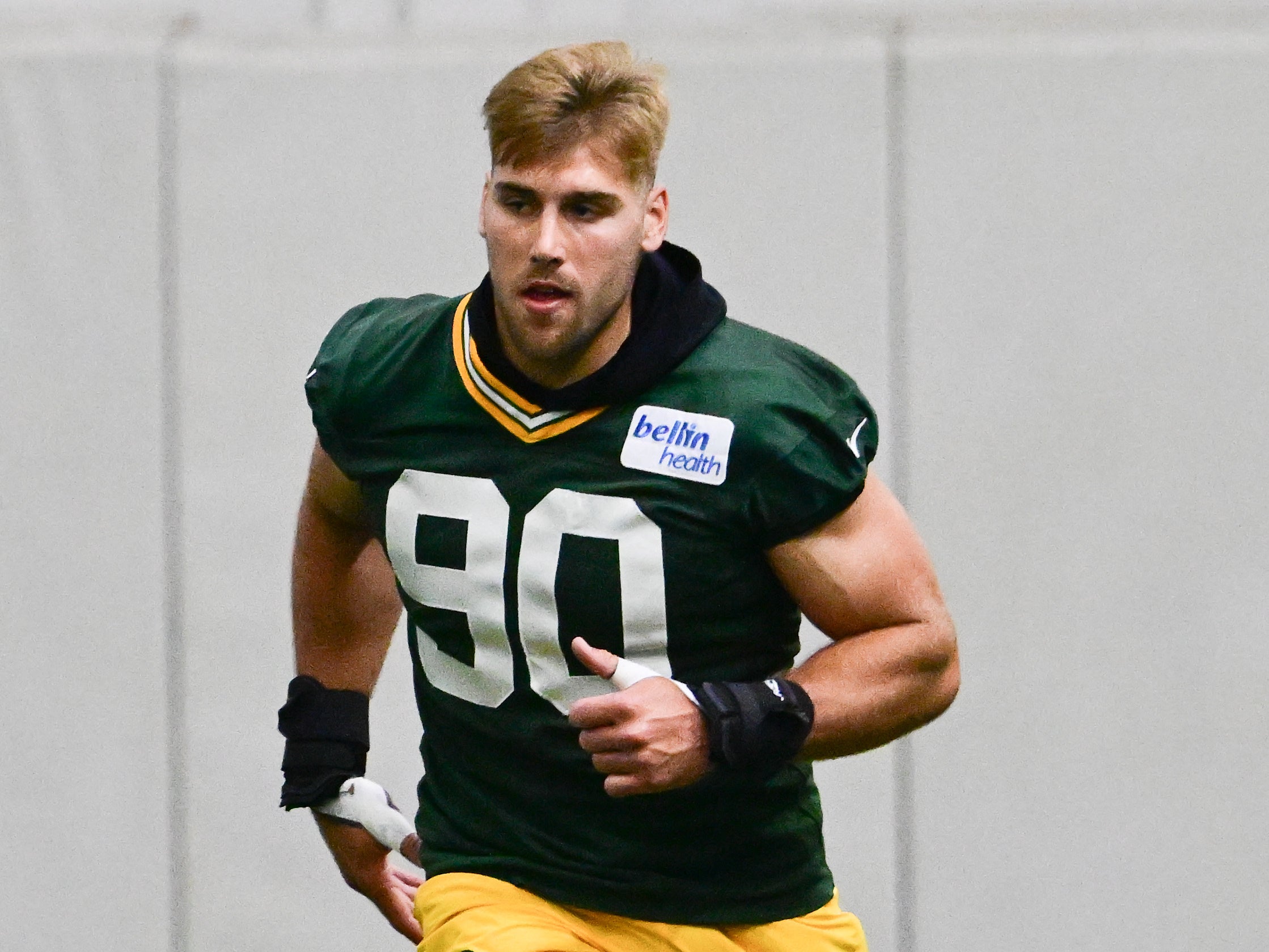 Green Bay Packers defensive end Lukas Van Ness (90) participates in the team's minicamp at Ray Nitschke Field.