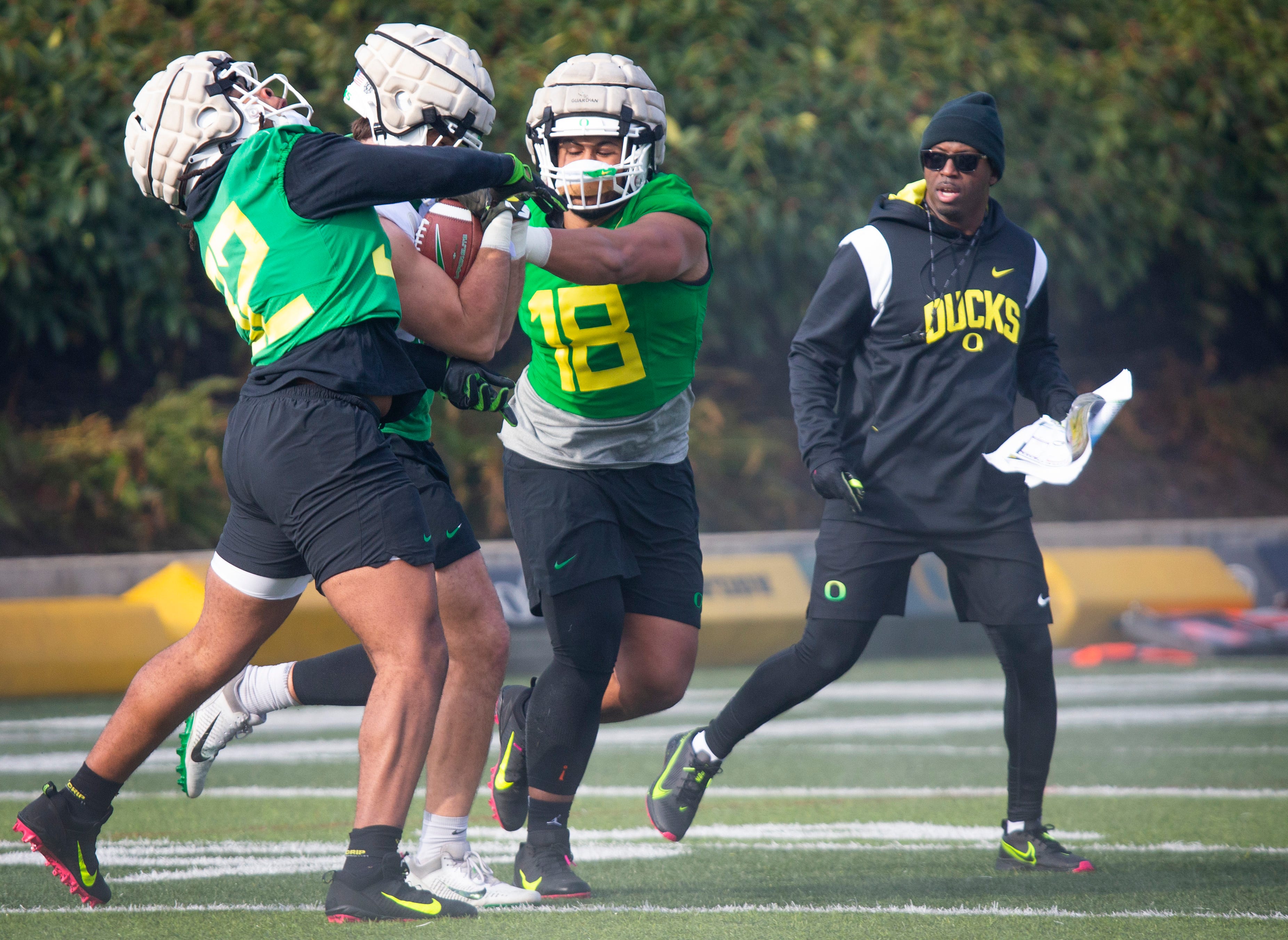 New co-defensive coordinator and safeties coach Chris Hampton, right, joins the first practice of spring for Oregon football as they prepare for the 2023 season. Eug 031623 Uo Spring Fb 06  