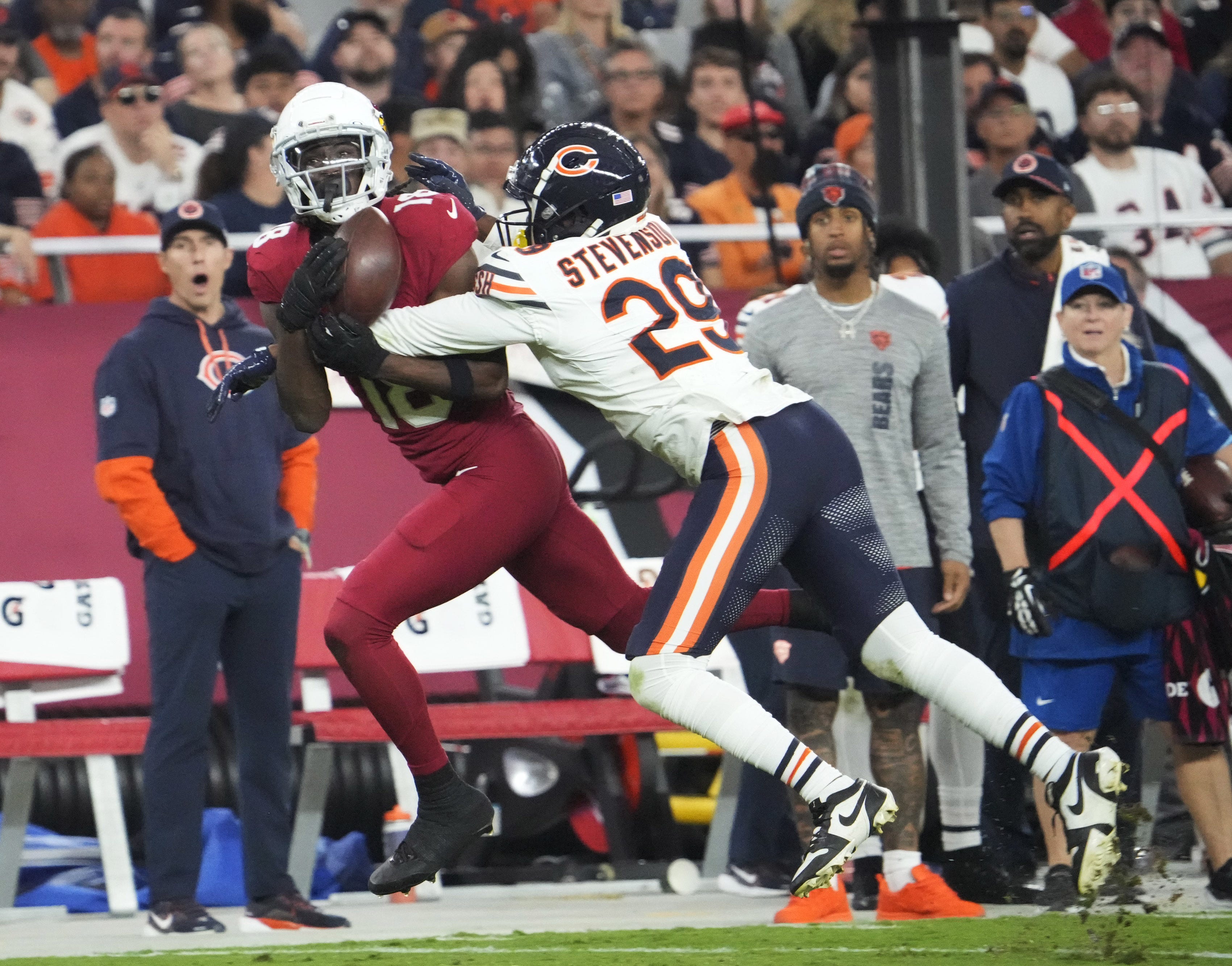 Arizona Cardinals wide receiver Marvin Harrison Jr. (18) has his catch broken up by Chicago Bears cornerback Tyrique Stevenson (29) during the fourth quarter at State Farm Stadium on Nov 3, 2024, in Glendale.