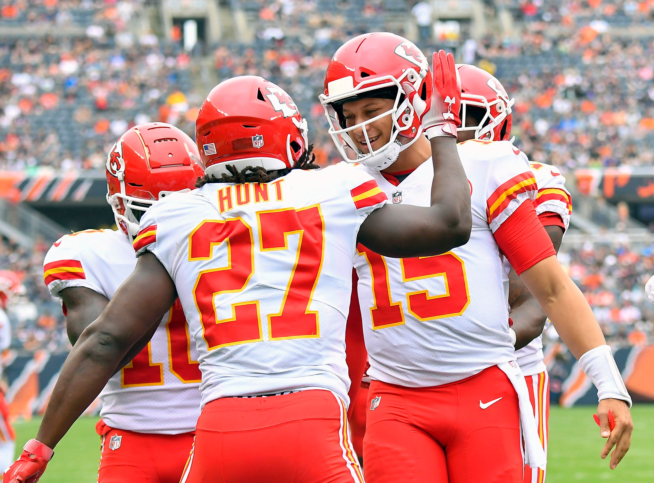 Kansas City Chiefs quarterback Patrick Mahomes (15) and running back Kareem Hunt (27) celebrate a touchdown.
