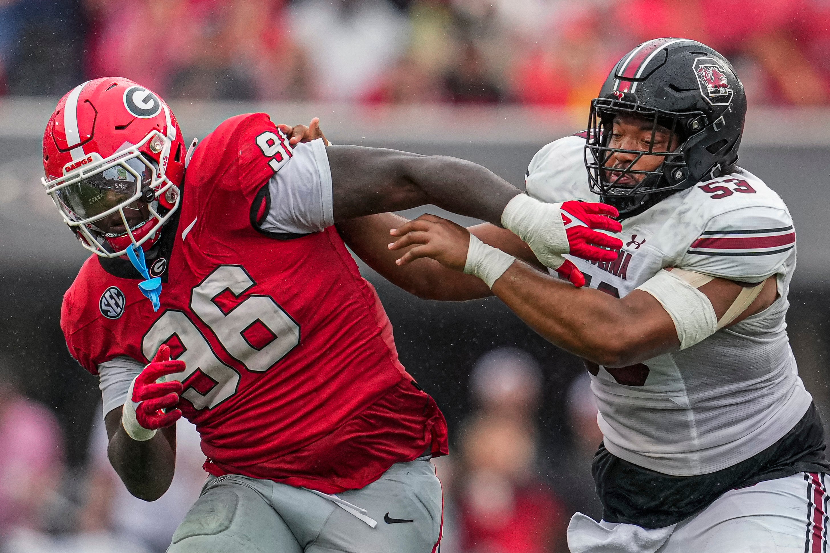 Sep 16, 2023; Athens, Georgia, USA; South Carolina Gamecocks offensive lineman Vershon Lee (53) blocks Georgia Bulldogs defensive lineman Zion Logue (96) during the second half at Sanford Stadium.